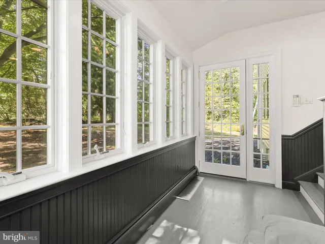 a bedroom with a bed and a closet