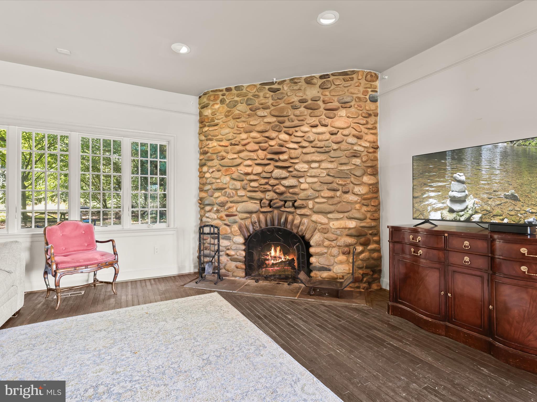 5708 Emory Road Upperco, MD 21155 - Photo 29 of 78 a living room with furniture and a fireplace