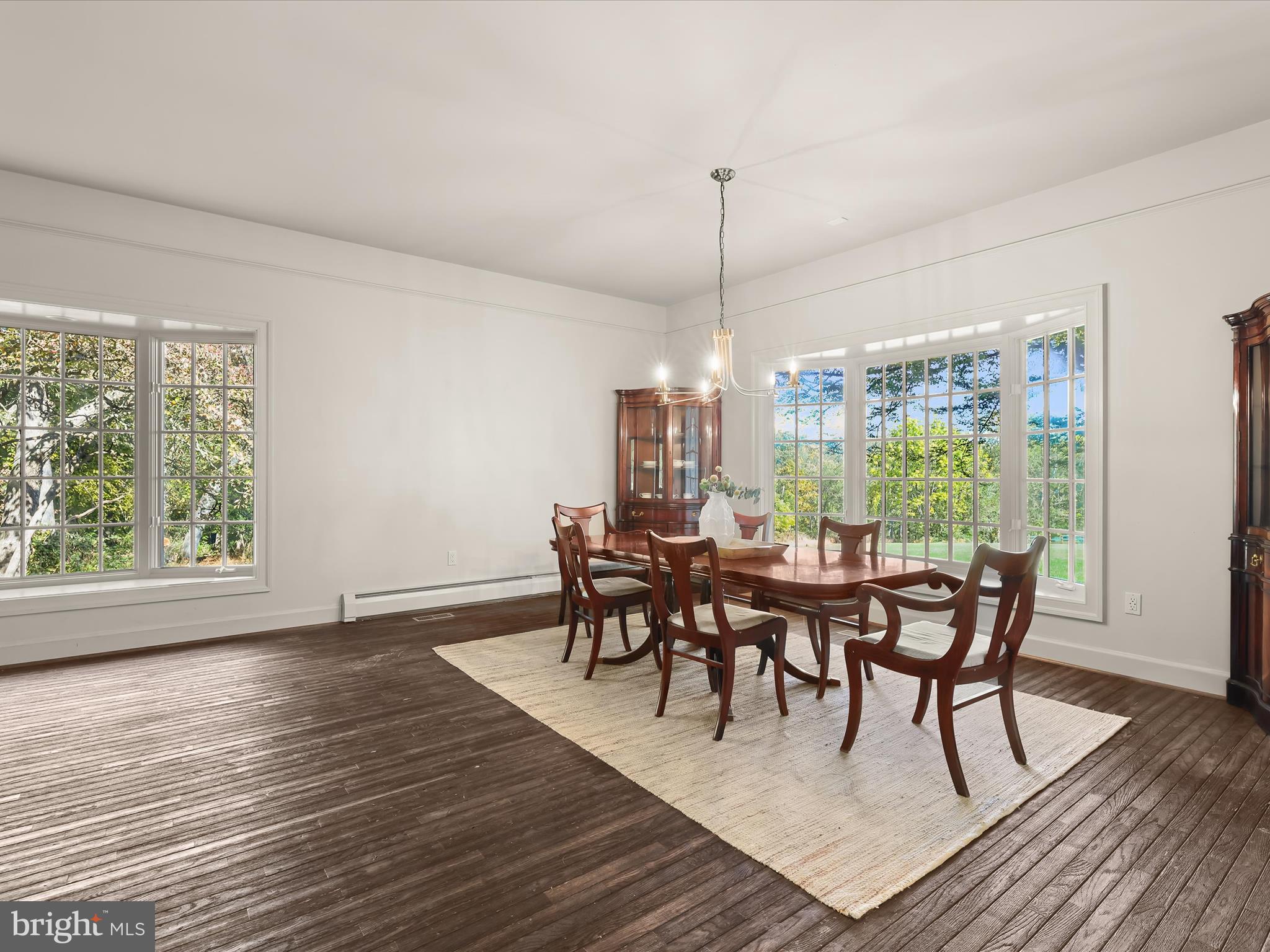 5708 Emory Road Upperco, MD 21155 - Photo 33 of 78 a view of a dining room with furniture window and wooden floor