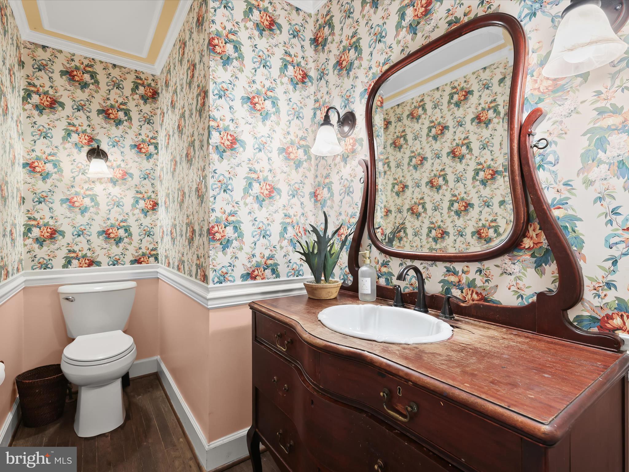 5708 Emory Road Upperco, MD 21155 - Photo 35 of 78 a bathroom with a toilet sink and mirror