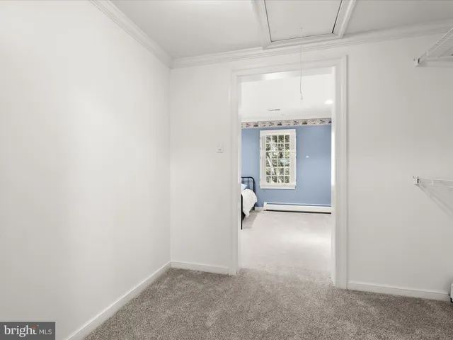 a black and white photo of a living room