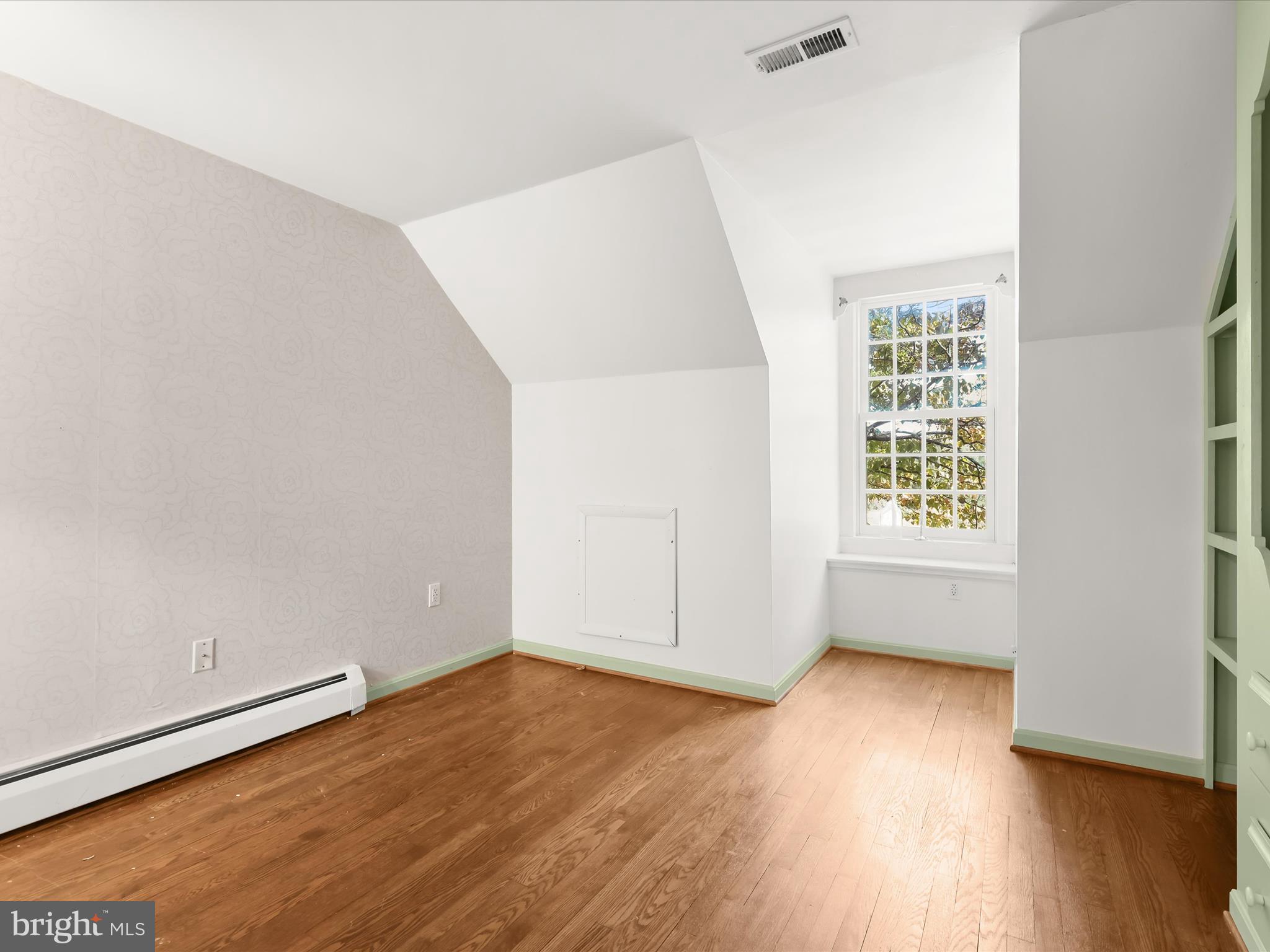 5708 Emory Road Upperco, MD 21155 - Photo 54 of 78 an empty room with wooden floor and windows