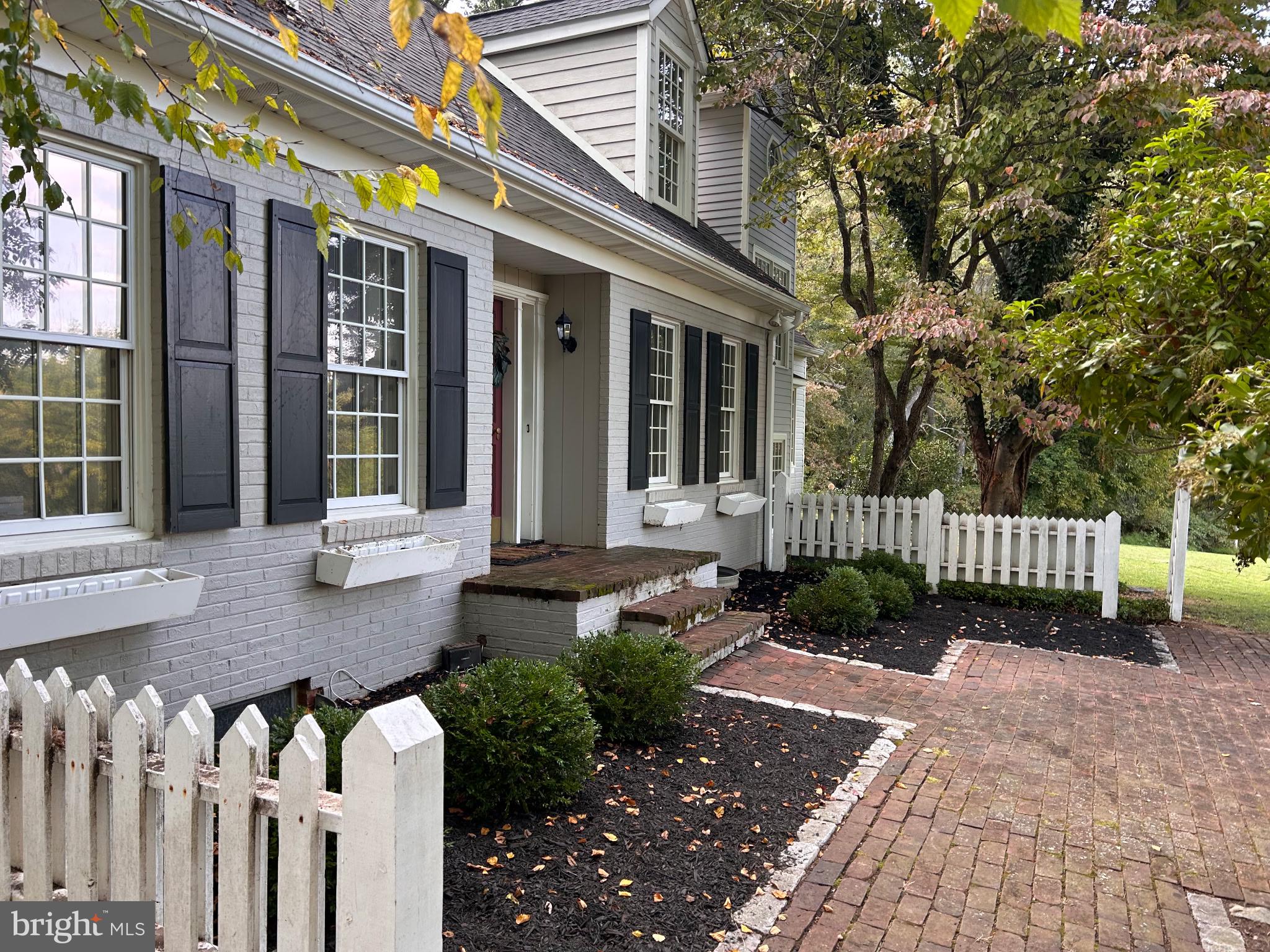5708 Emory Road Upperco, MD 21155 - Photo 73 of 78 a view of a house with a small yard and wooden fence