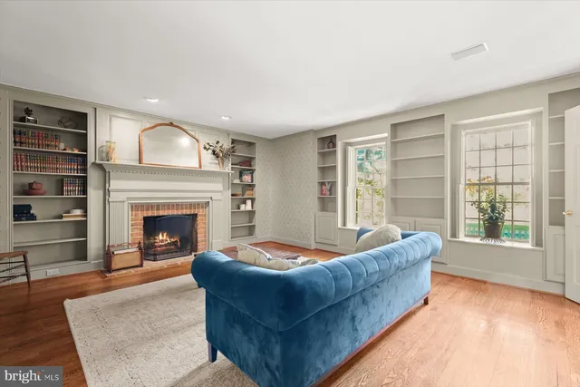 a kitchen with stainless steel appliances granite countertop a refrigerator and a stove