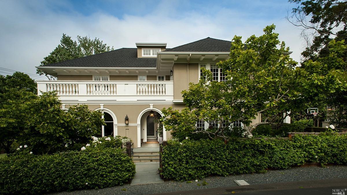 1 Woodside Way Ross, CA 94957 - Photo 1 of 1 a front view of a house with plants and trees