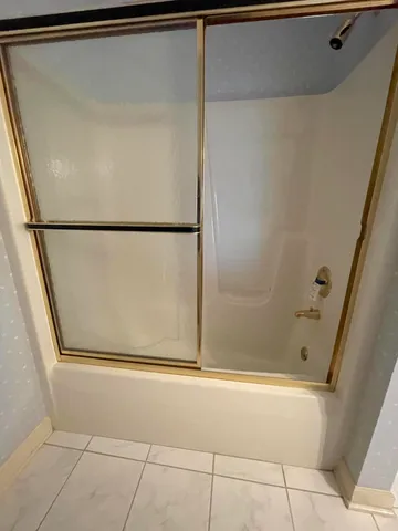 a view of parking garage with cars