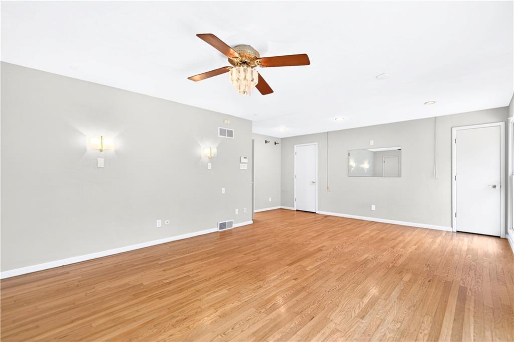 1443 Stoltz Road Bethel Park, PA 15102 - Photo 13 of 49 a view of empty room with wooden floor