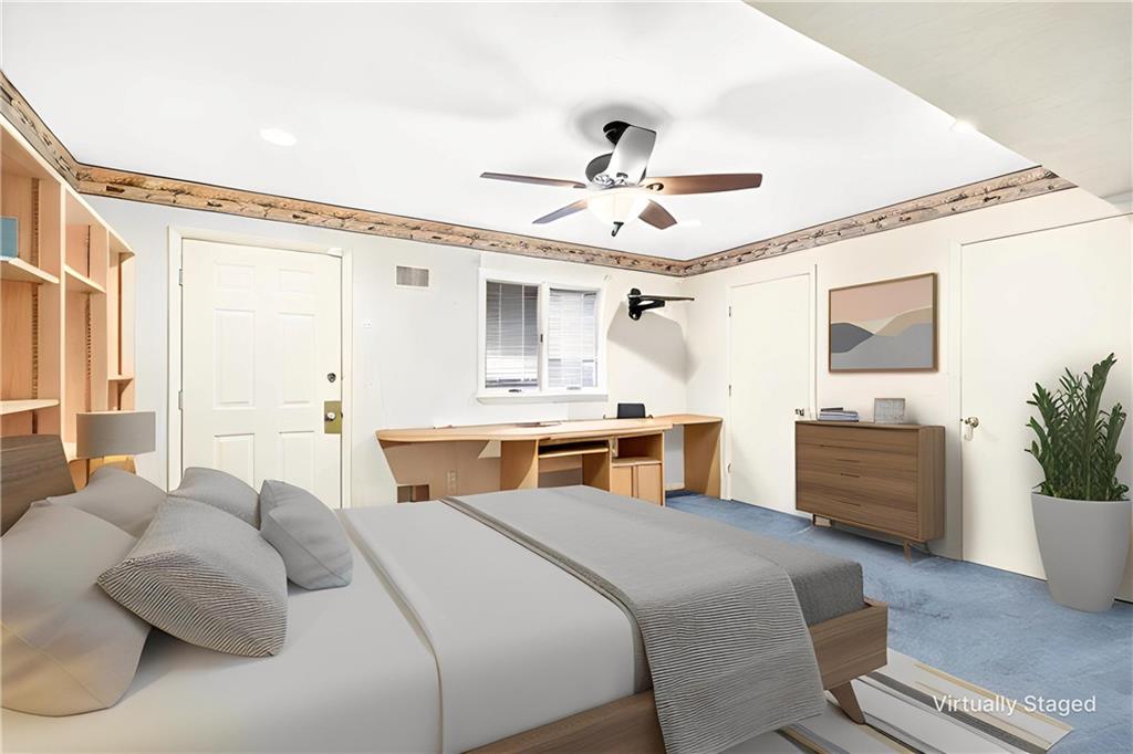 1443 Stoltz Road Bethel Park, PA 15102 - Photo 26 of 49 a bedroom with a bed ceiling fan and a window