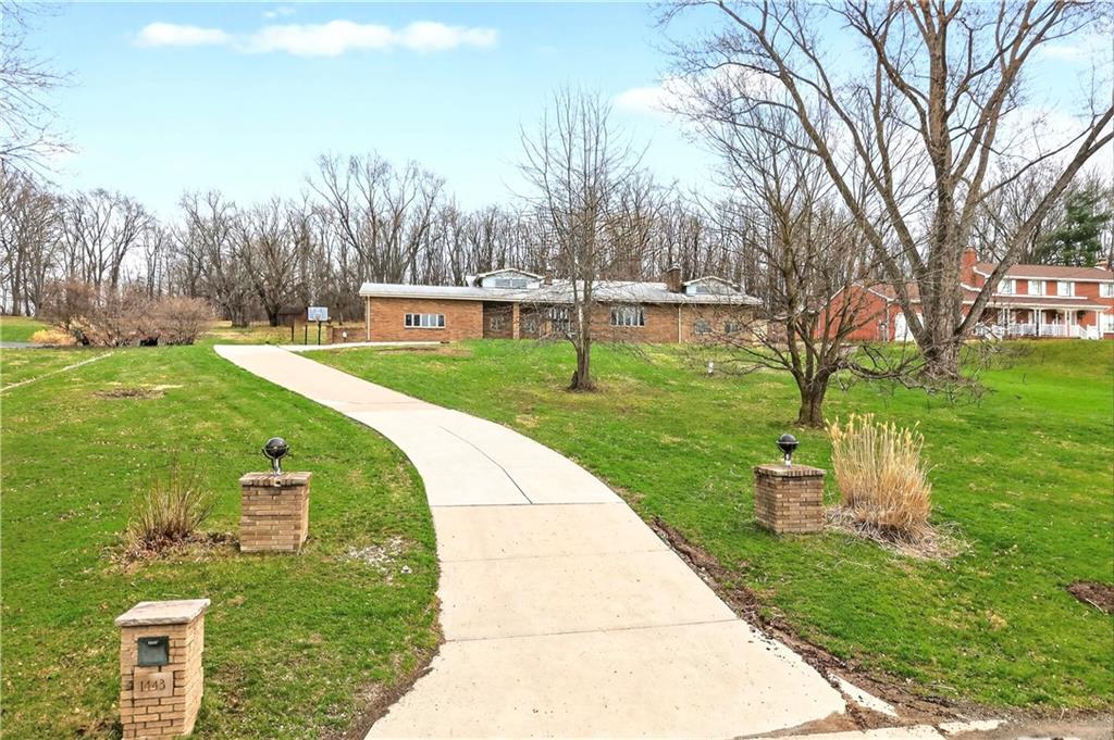 1443 Stoltz Road Bethel Park, PA 15102 - Photo 40 of 49 a view of a garden with trees