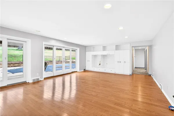 a kitchen with a sink cabinets and utility