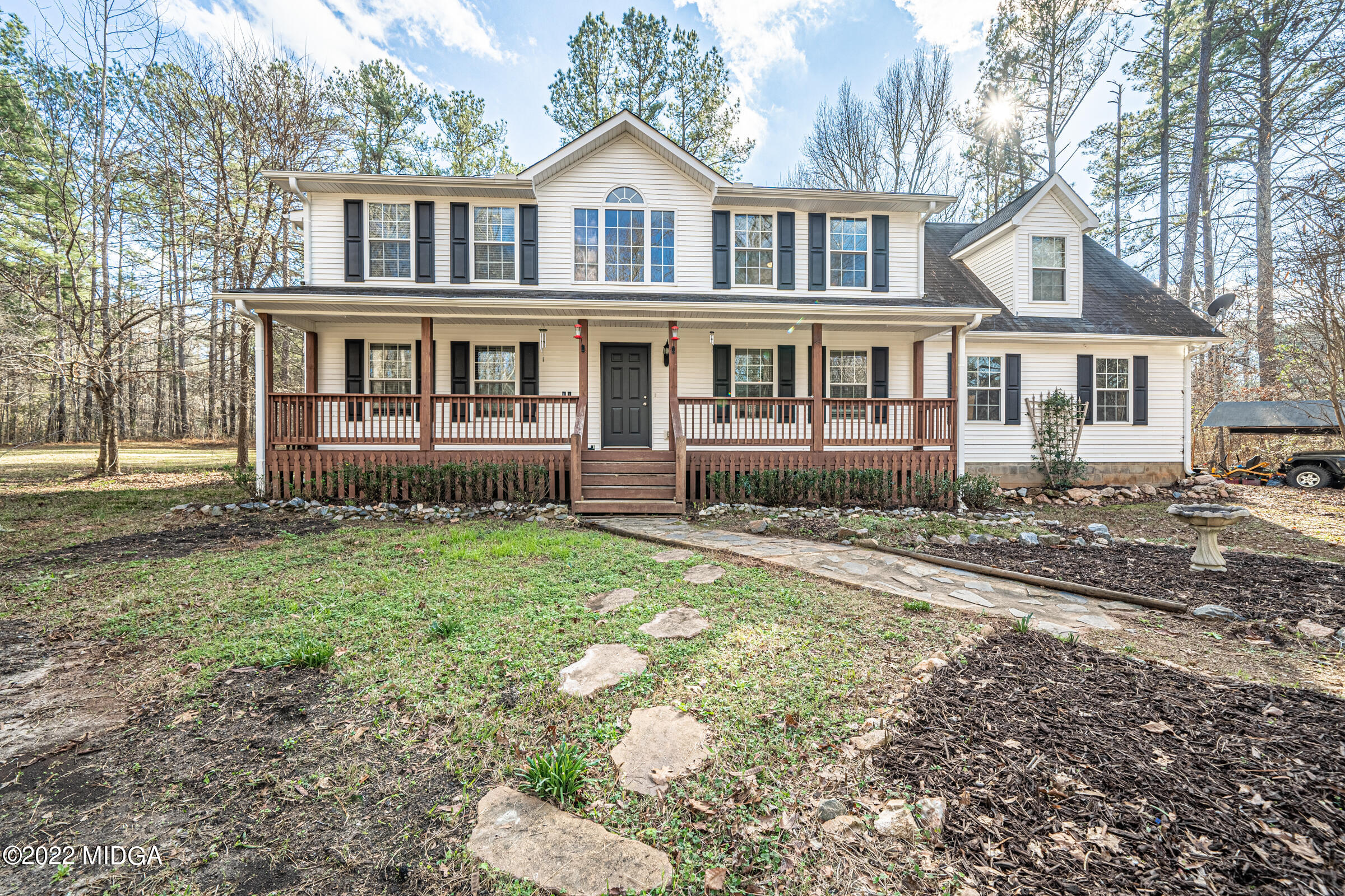 229 Howard Roberts Road Gray, GA 31032 - Photo 1 of 28 a front view of a house with yard