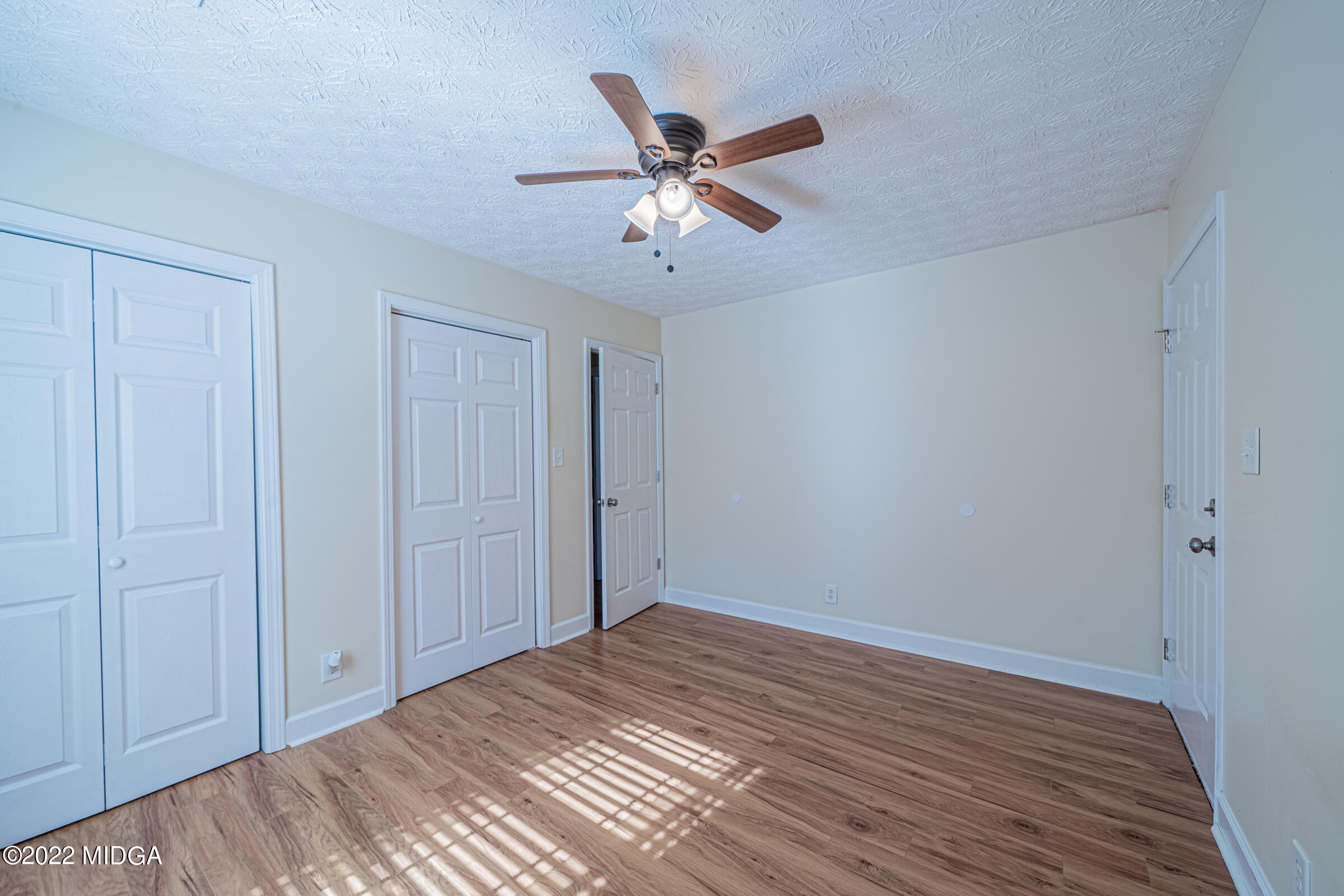 229 Howard Roberts Road Gray, GA 31032 - Photo 13 of 28 a view of a room with a ceiling fan