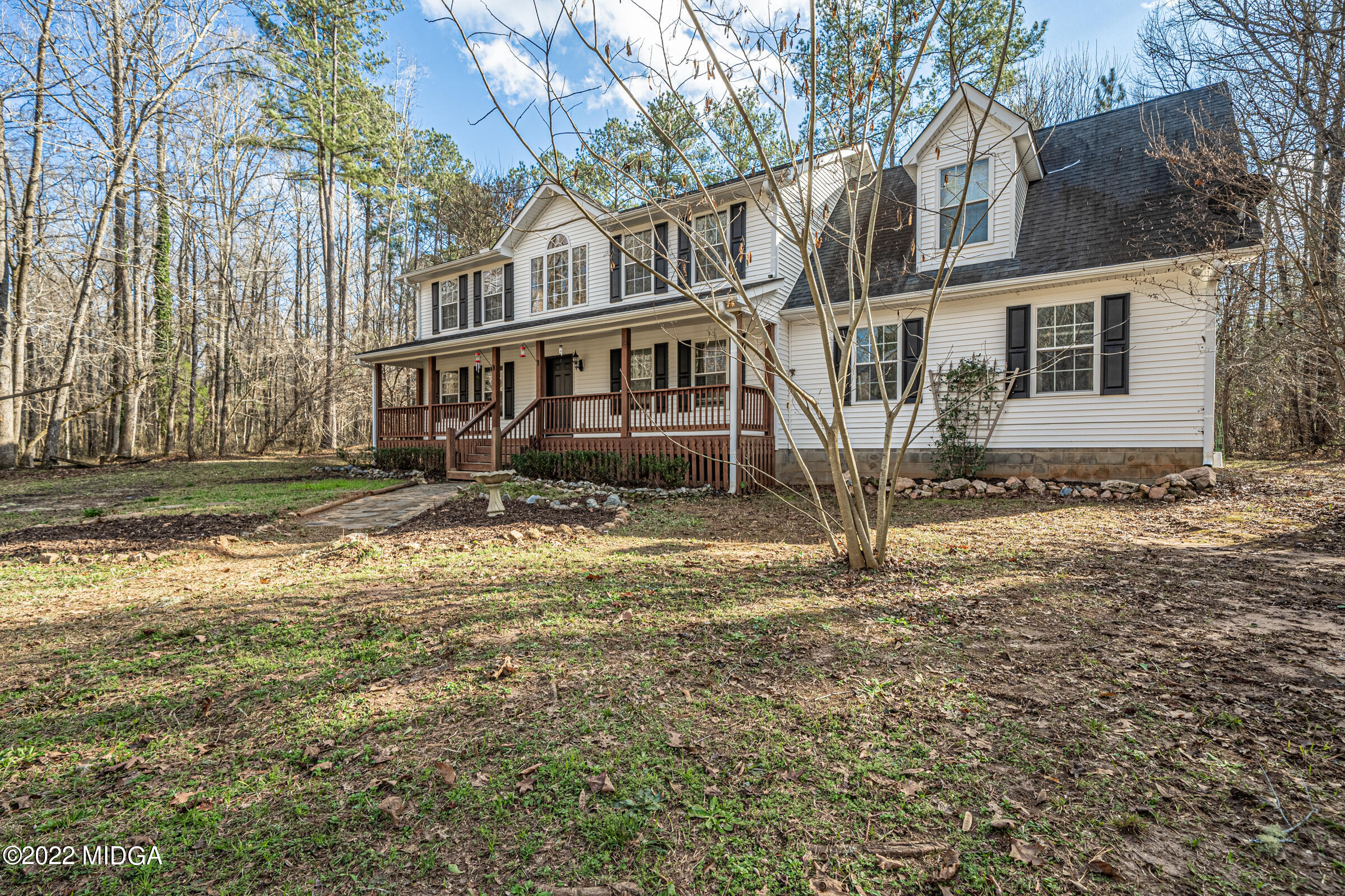 229 Howard Roberts Road Gray, GA 31032 - Photo 2 of 28 a front view of a house with a yard