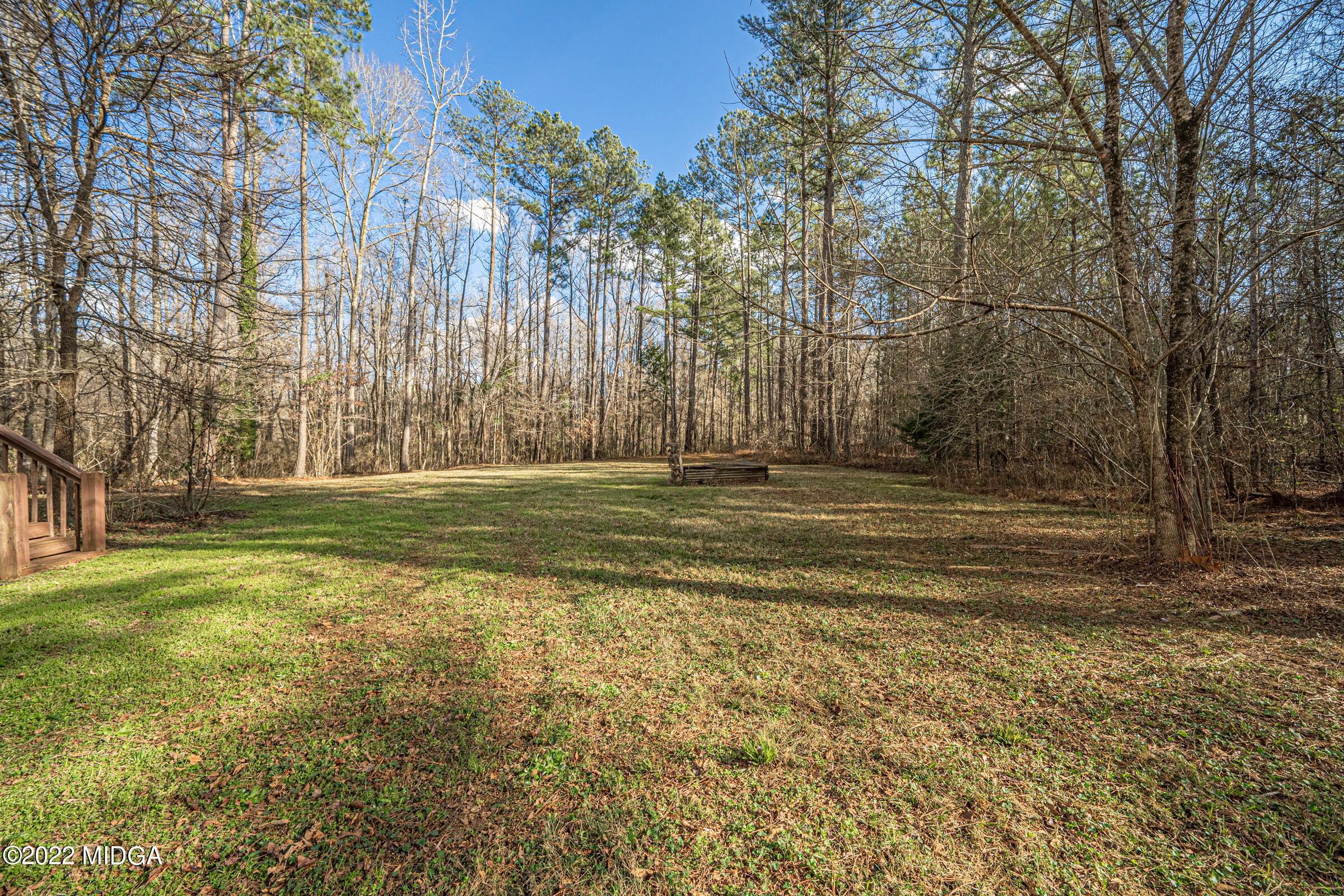 229 Howard Roberts Road Gray, GA 31032 - Photo 24 of 28 a view of a field with trees