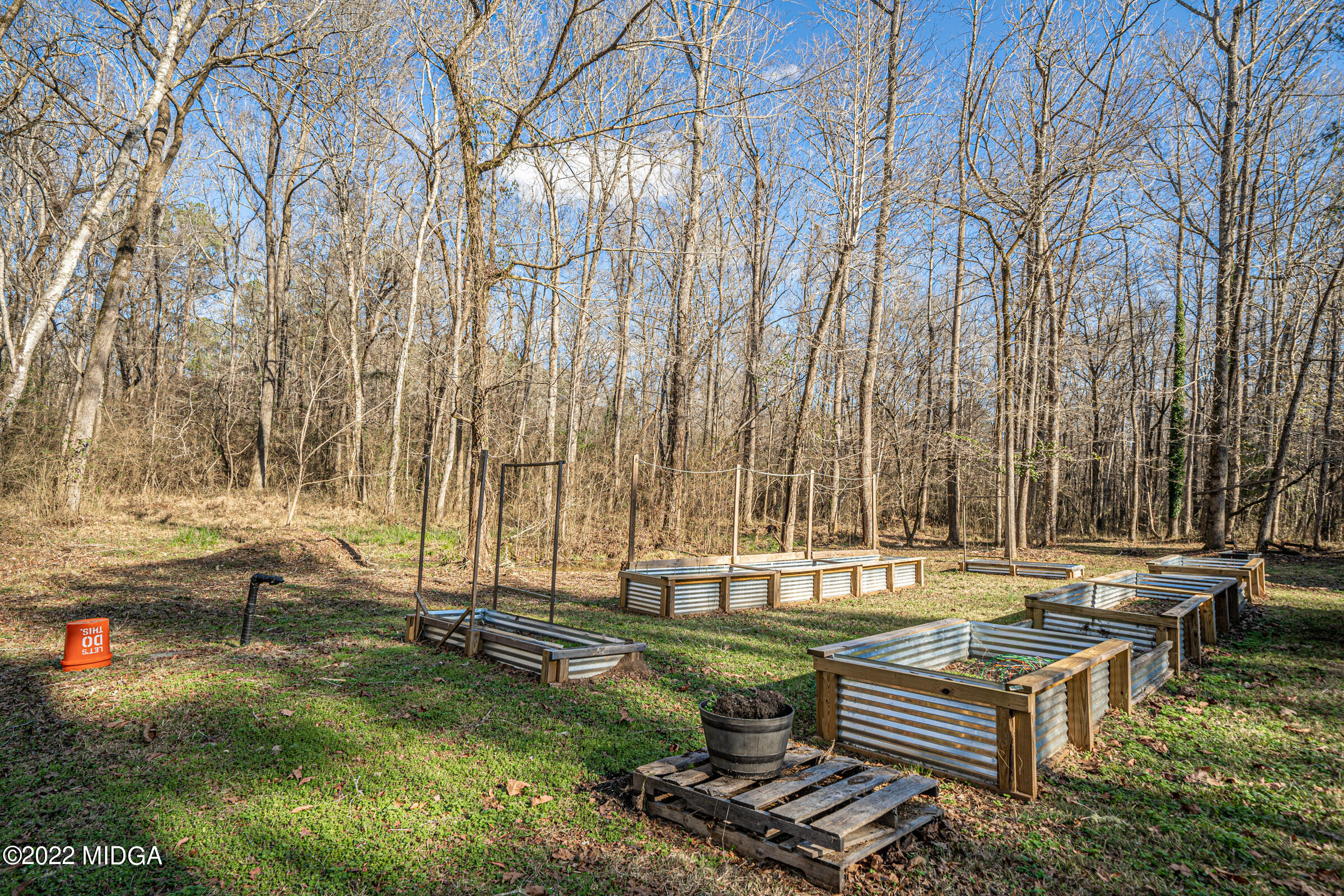 229 Howard Roberts Road Gray, GA 31032 - Photo 26 of 28 a backyard of a house with outdoor seating