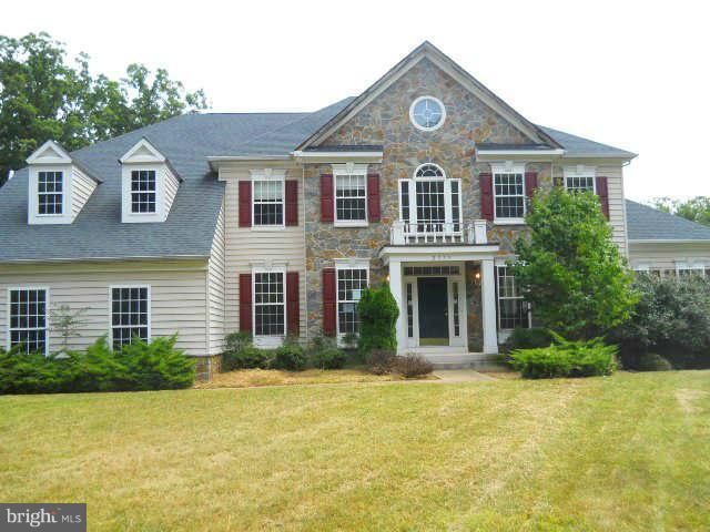 2375 Mountain Road Haymarket, VA 20169 - Photo 2 of 19 a front view of a house with a yard