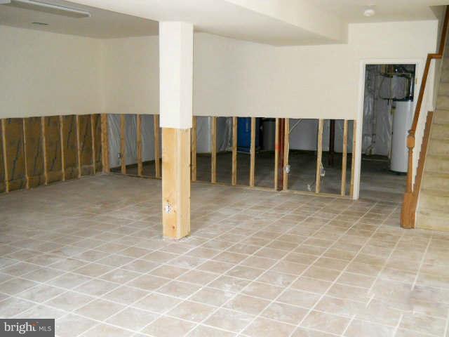 2375 Mountain Road Haymarket, VA 20169 - Photo 13 of 19 a view of an empty room with wooden floor