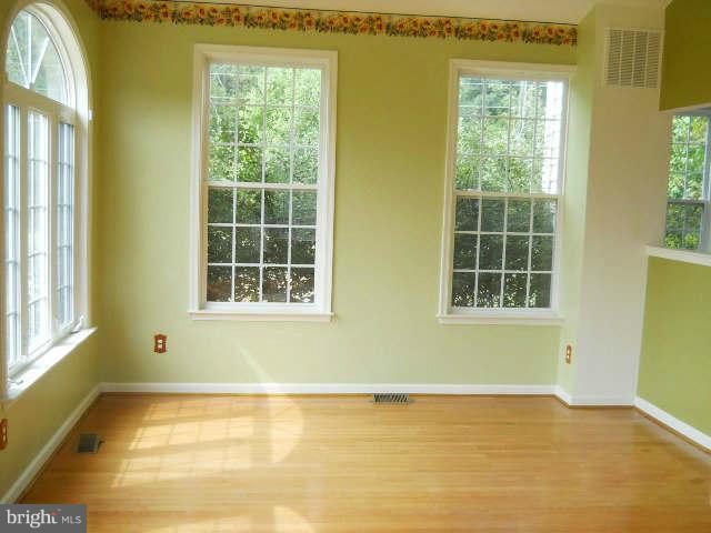 2375 Mountain Road Haymarket, VA 20169 - Photo 5 of 19 a view of an empty room with a window