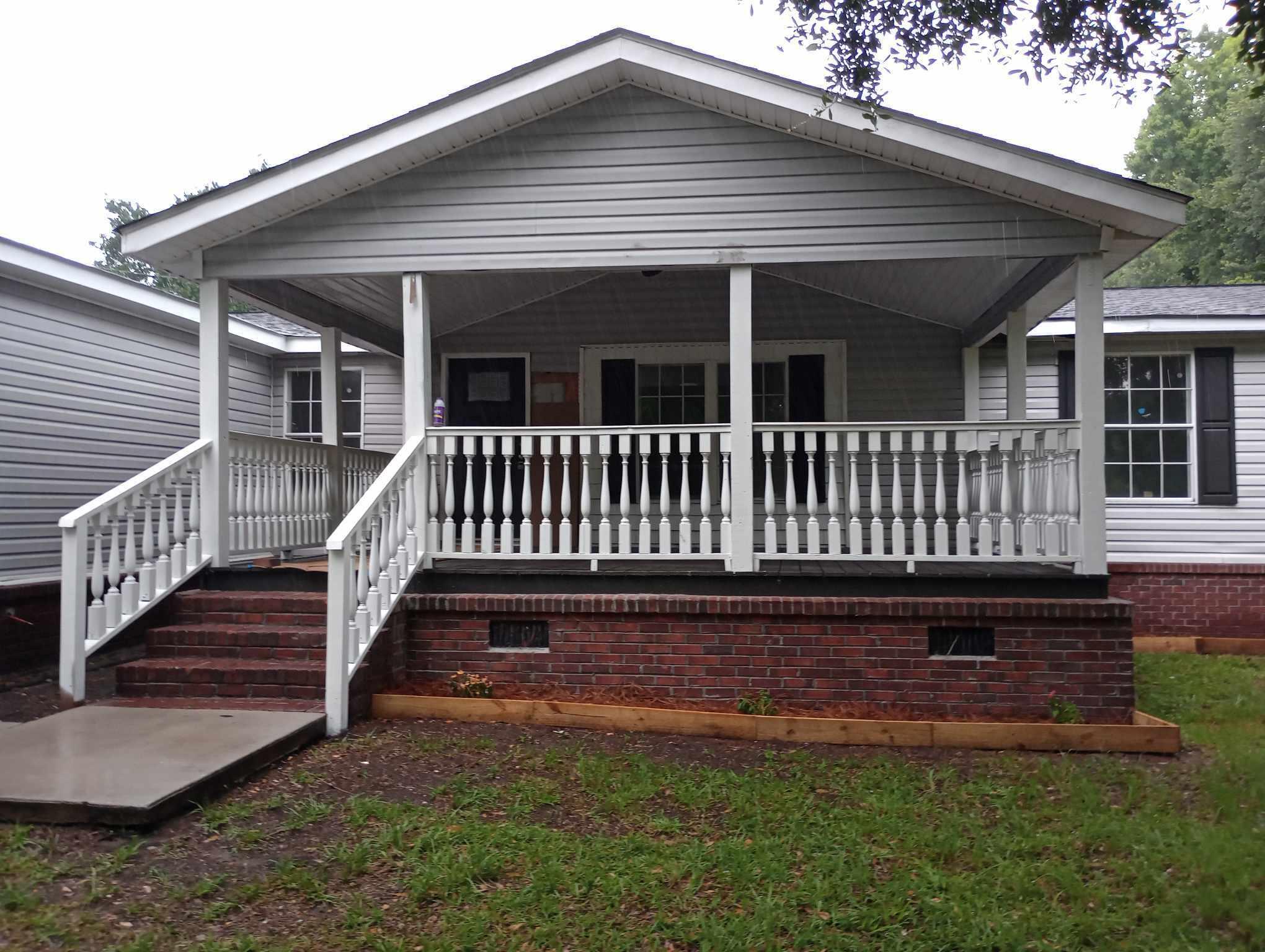 1058 Cainhoy Road Wando, SC 29492 - Photo 2 of 25 449716176_754059410001714_91879632625054