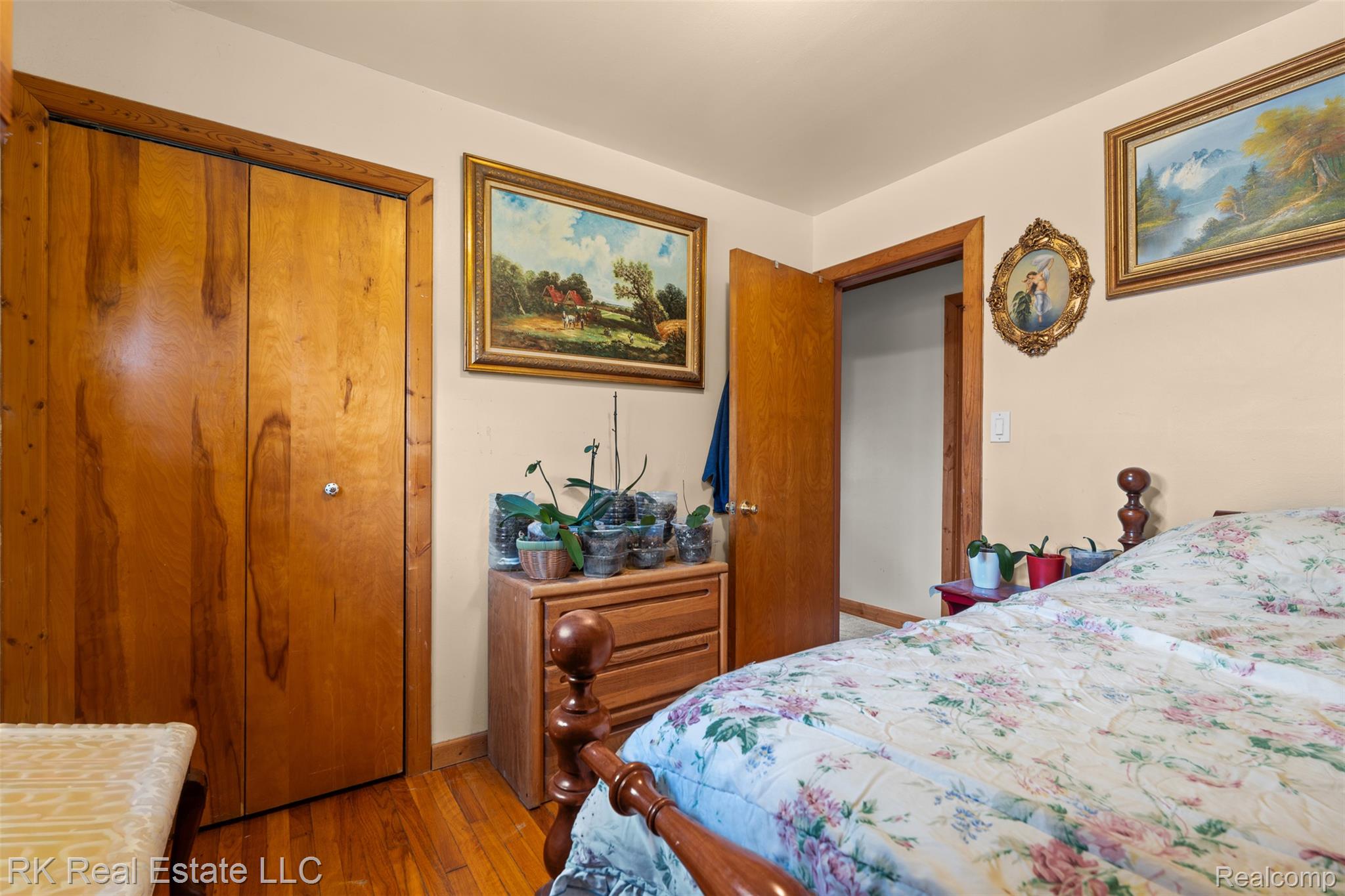 13799 31 Mile Road Washington, MI 48095 - Photo 21 of 40 Bedroom with light wood-style floors and a closet