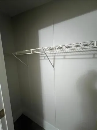 a living room with furniture window and wooden floor