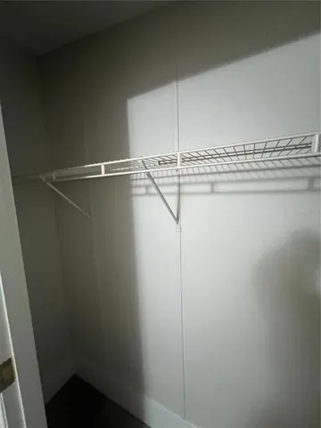 a living room with furniture window and wooden floor