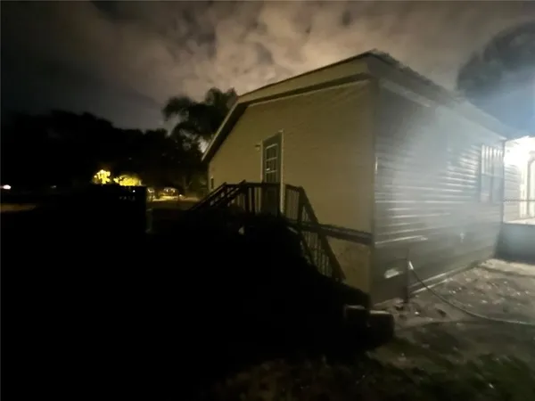 a view of backyard with tree