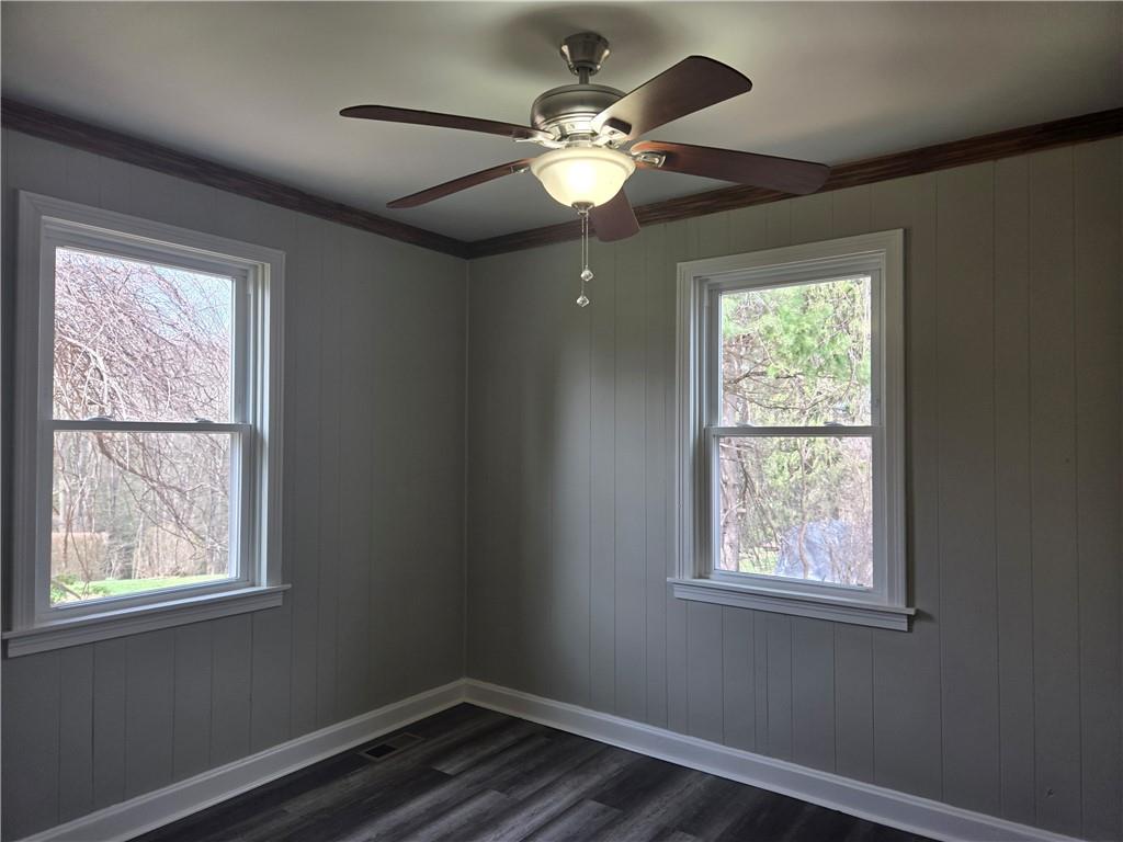 1425 Barclay Hill Road Beaver, PA 15009 - Photo 14 of 30 an empty room with wooden floor and windows