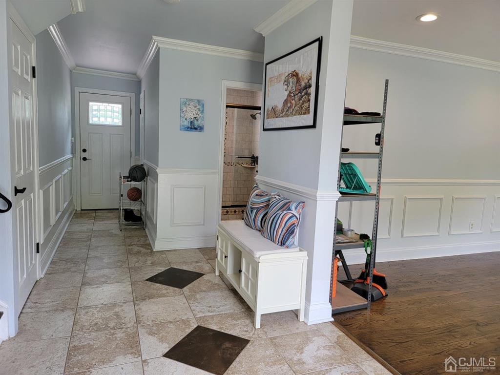 15 Colburn Road East Brunswick, NJ 08816 - Photo 3 of 23 Come on in! Spacious foyer with tile floor...