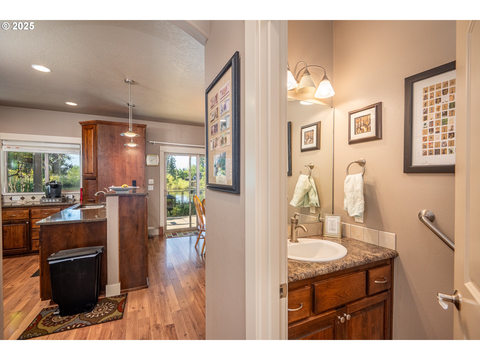 4756 Jessen Drive Eugene, OR 97402 - Photo 15 of 29 a bathroom with a sink a toilet and a mirror