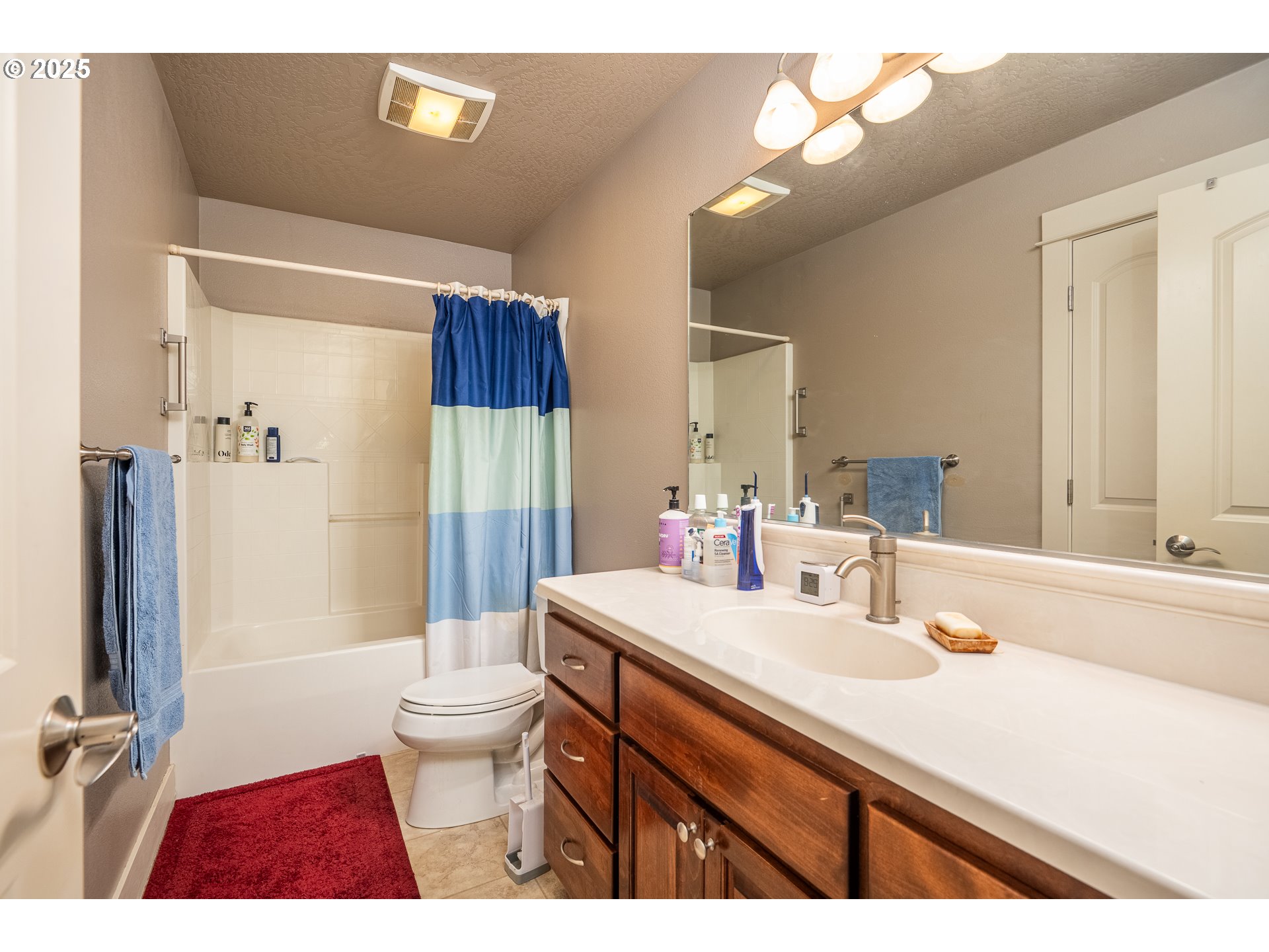 4756 Jessen Drive Eugene, OR 97402 - Photo 18 of 29 a bathroom with a sink a toilet and shower