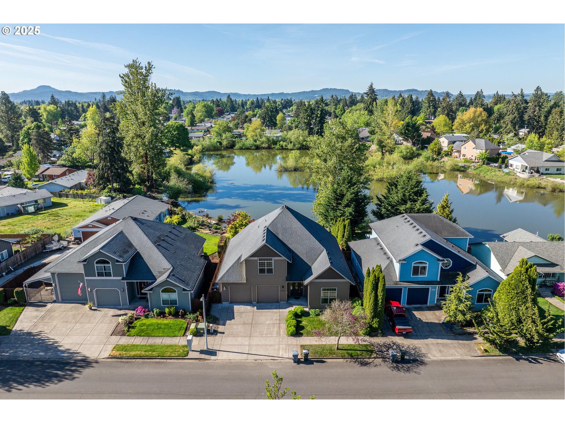 4756 Jessen Drive Eugene, OR 97402 - Photo 2 of 29 an aerial view of a house with a yard and outdoor seating