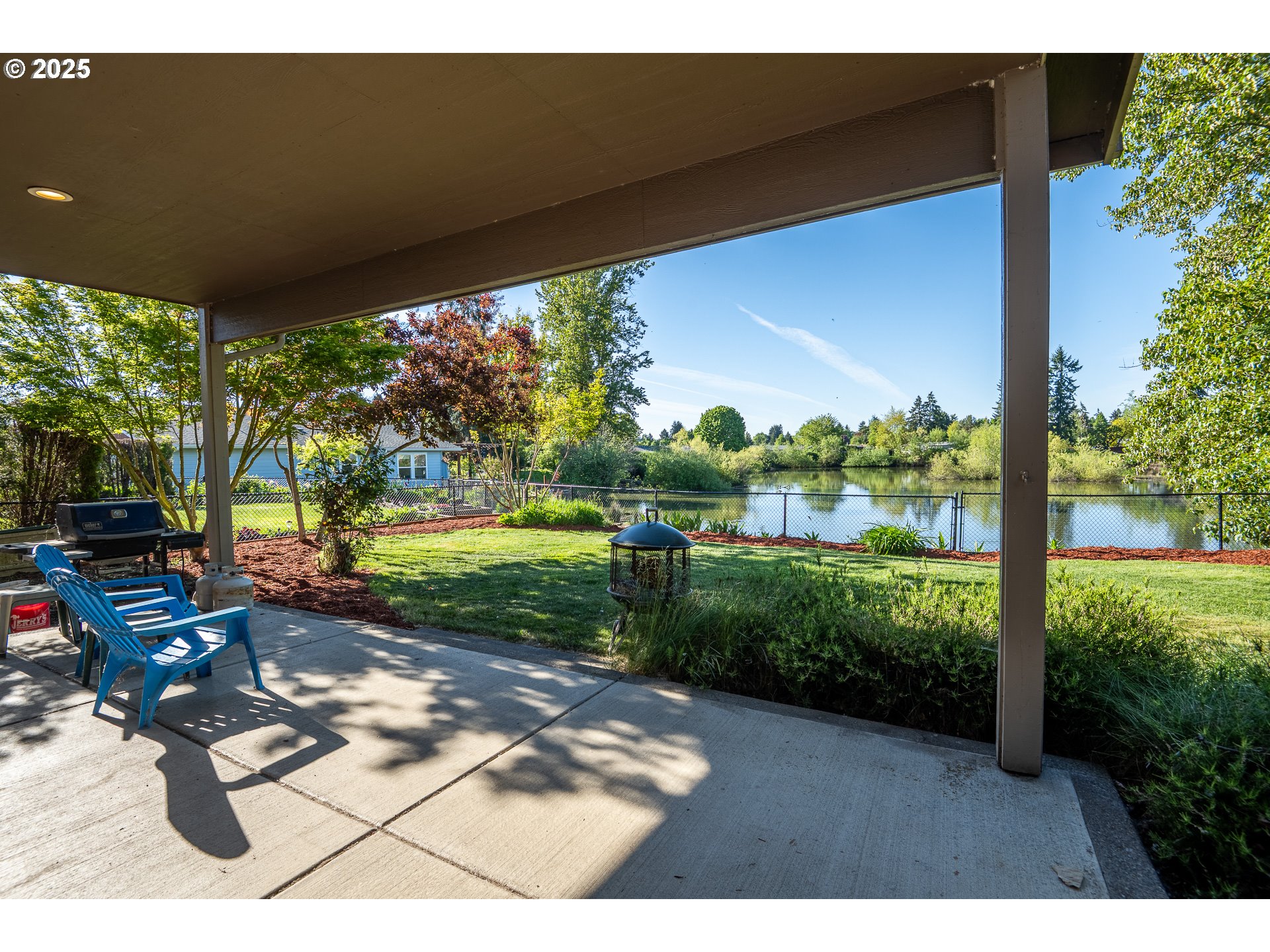 4756 Jessen Drive Eugene, OR 97402 - Photo 22 of 29 a view of a porch with furniture and garden