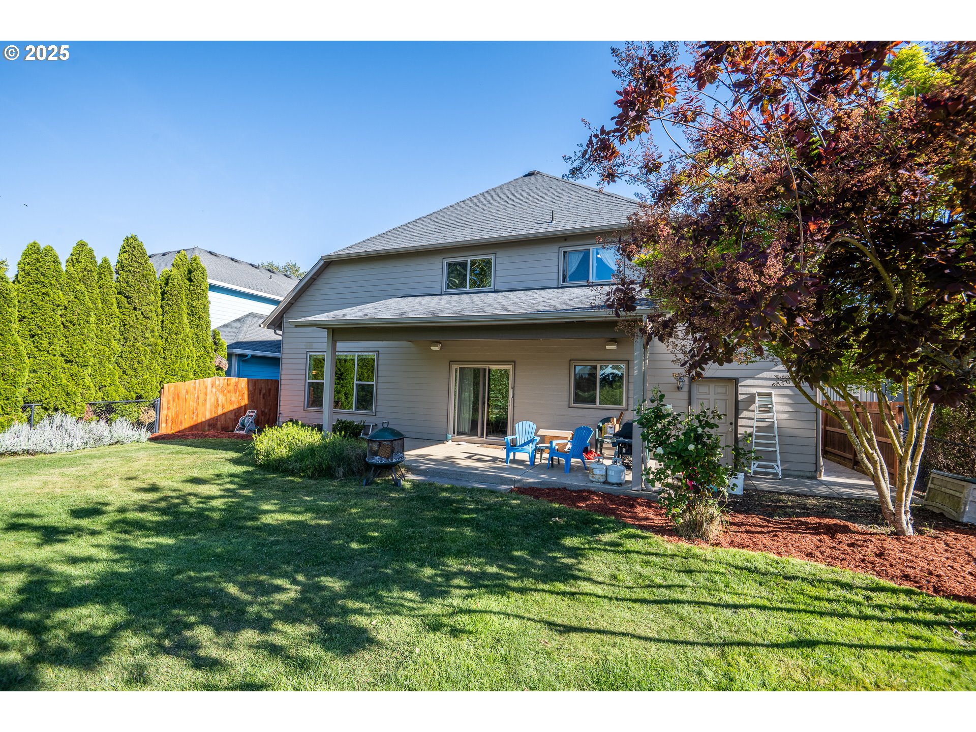 4756 Jessen Drive Eugene, OR 97402 - Photo 24 of 29 a front view of a house with a garden