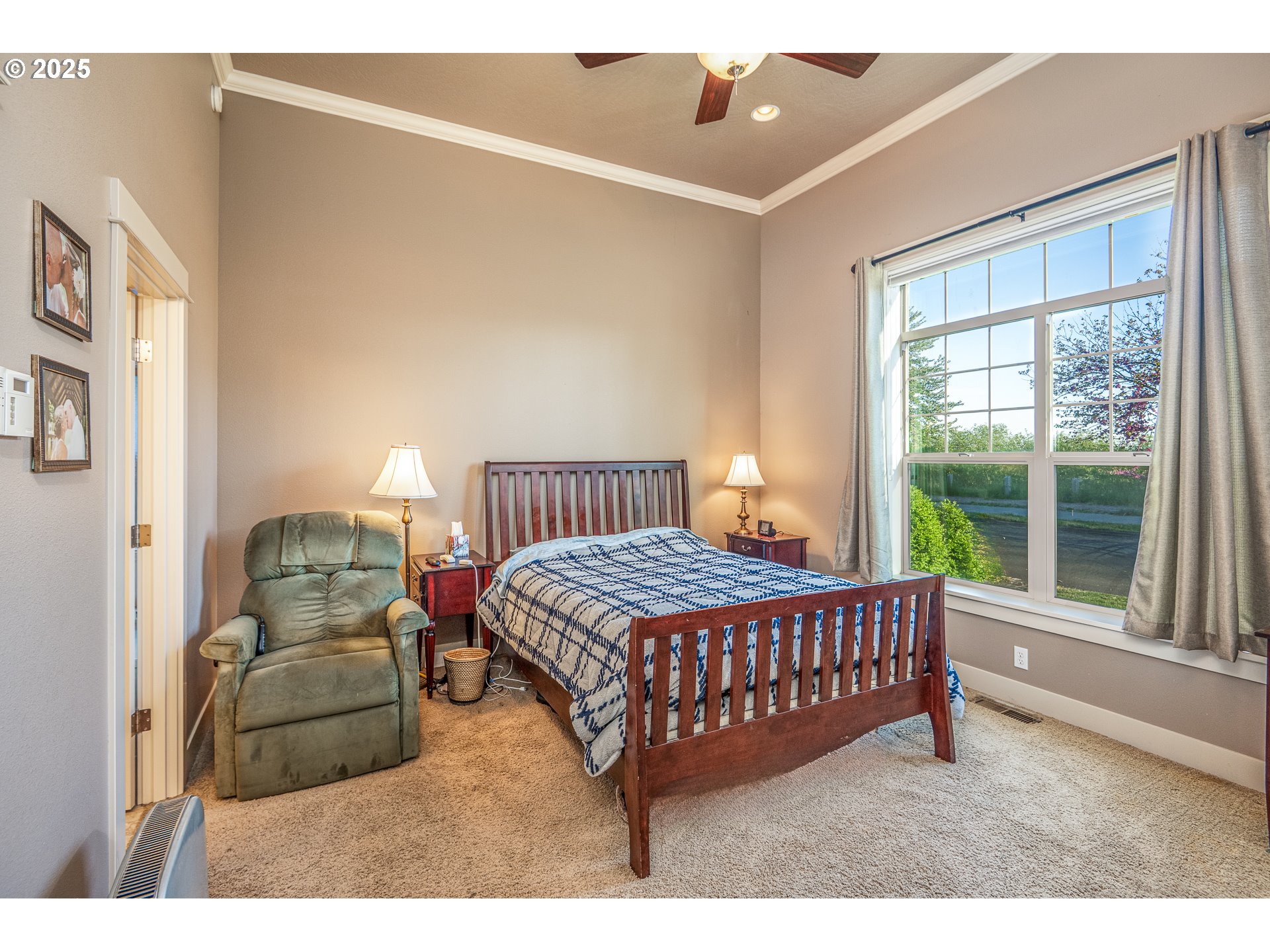 4756 Jessen Drive Eugene, OR 97402 - Photo 5 of 29 a bedroom with a bed and wooden floor