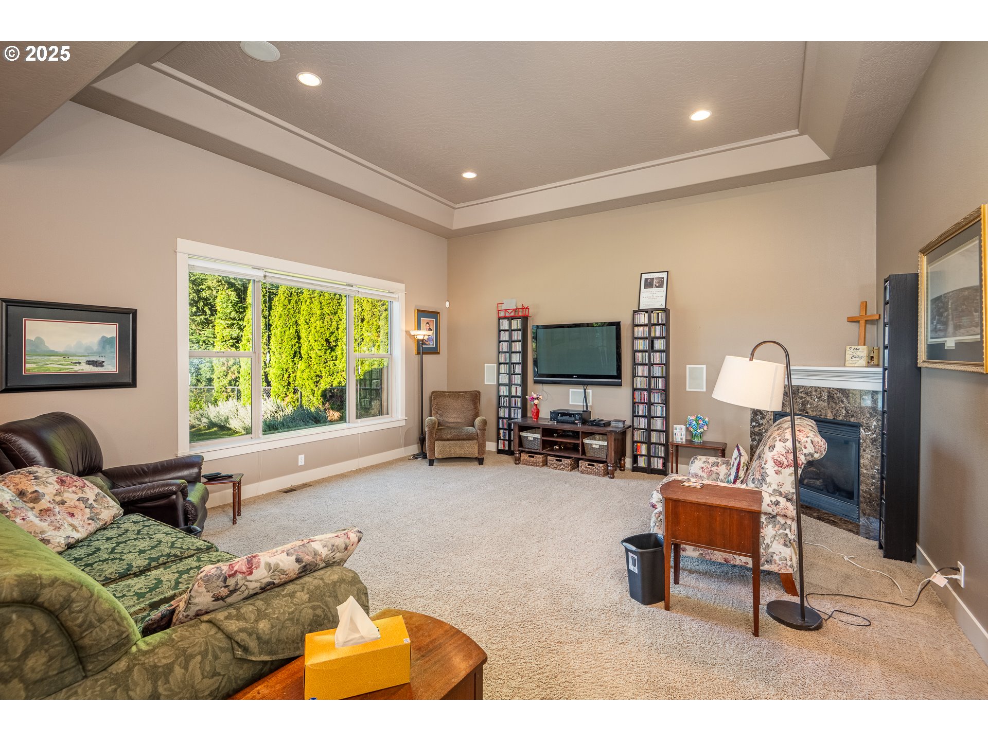 4756 Jessen Drive Eugene, OR 97402 - Photo 9 of 29 a living room with furniture and a flat screen tv