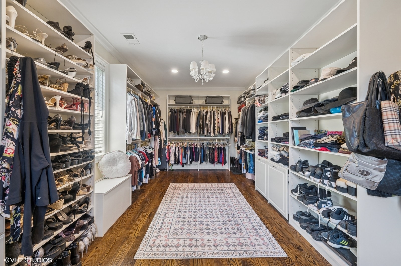 120 Maya Court Deerfield, IL 60015 - Photo 18 of 37 walk in closet with clothes and shoes