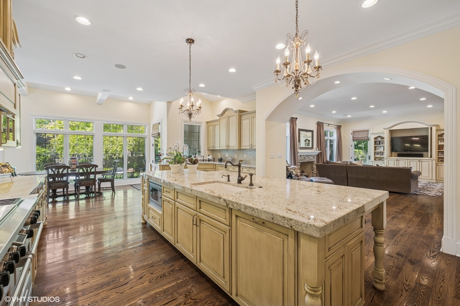 120 Maya Court Deerfield, IL 60015 - Photo 5 of 37 a large kitchen with kitchen island a large island in it