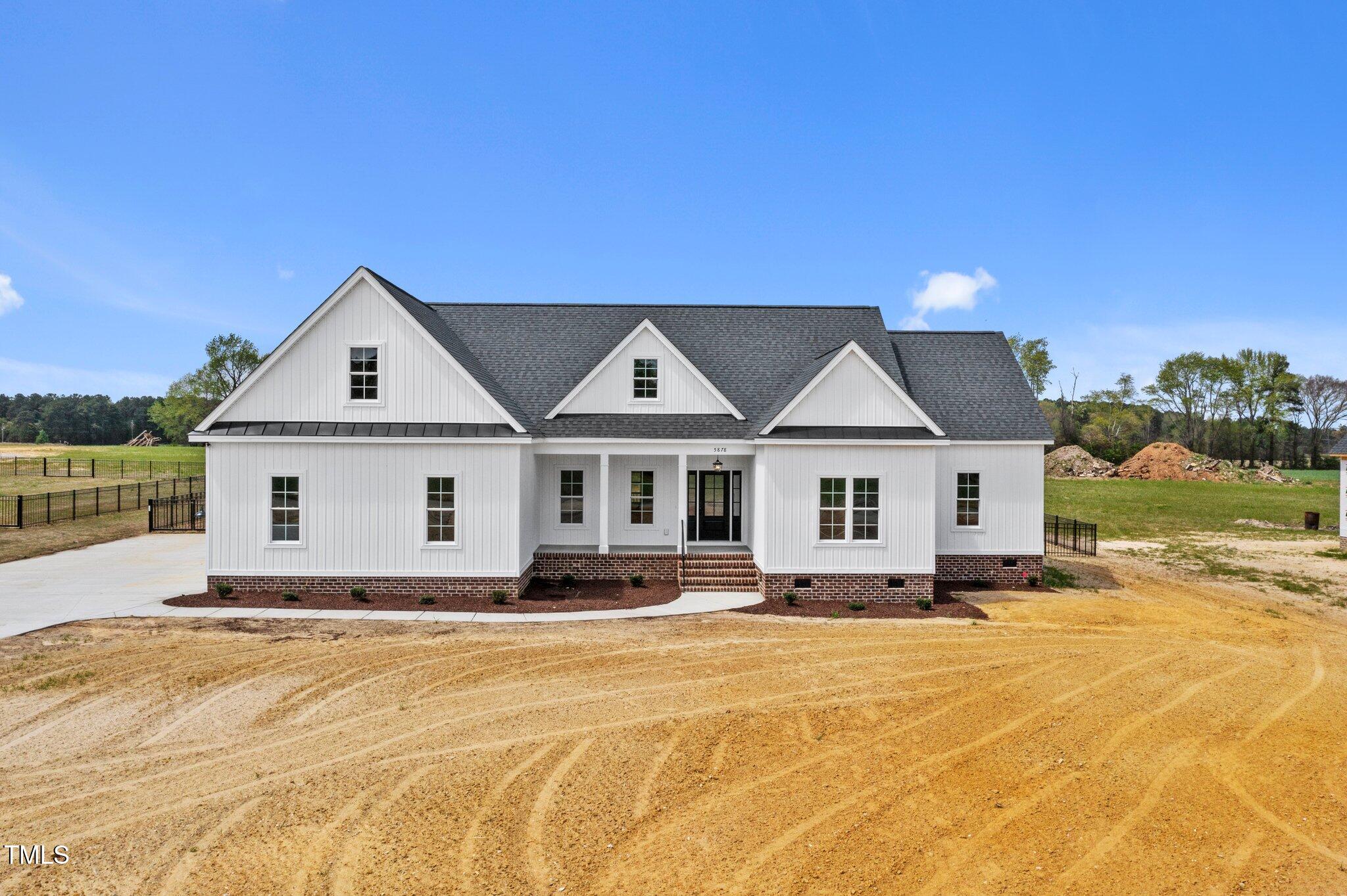 2379 Heartland Road Battleboro, NC 27809 - Photo 1 of 44 a front view of a house with a yard