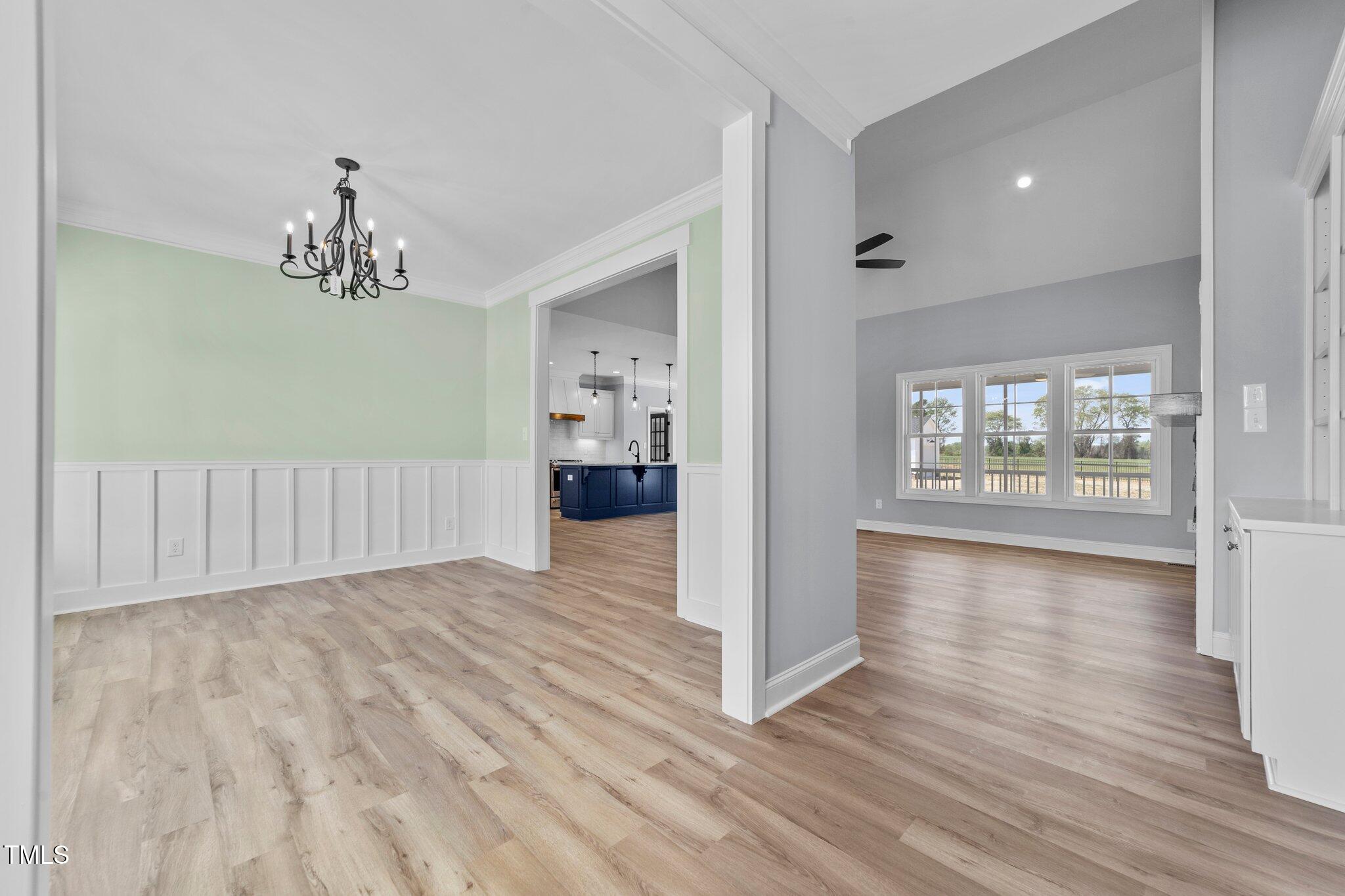 2379 Heartland Road Battleboro, NC 27809 - Photo 12 of 44 a view of a room with wooden floor and windows