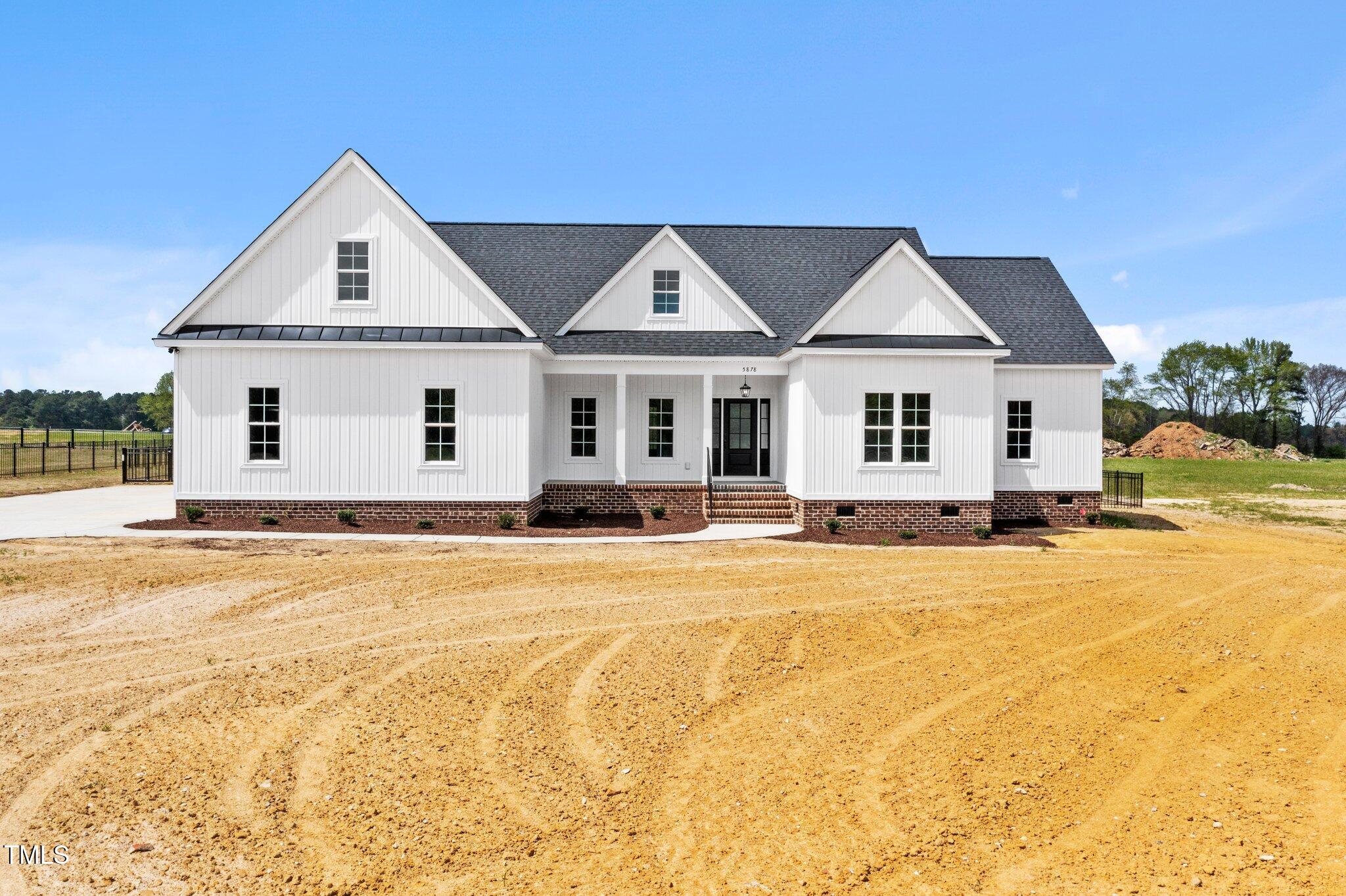 2379 Heartland Road Battleboro, NC 27809 - Photo 29 of 44 a front view of a house with a yard