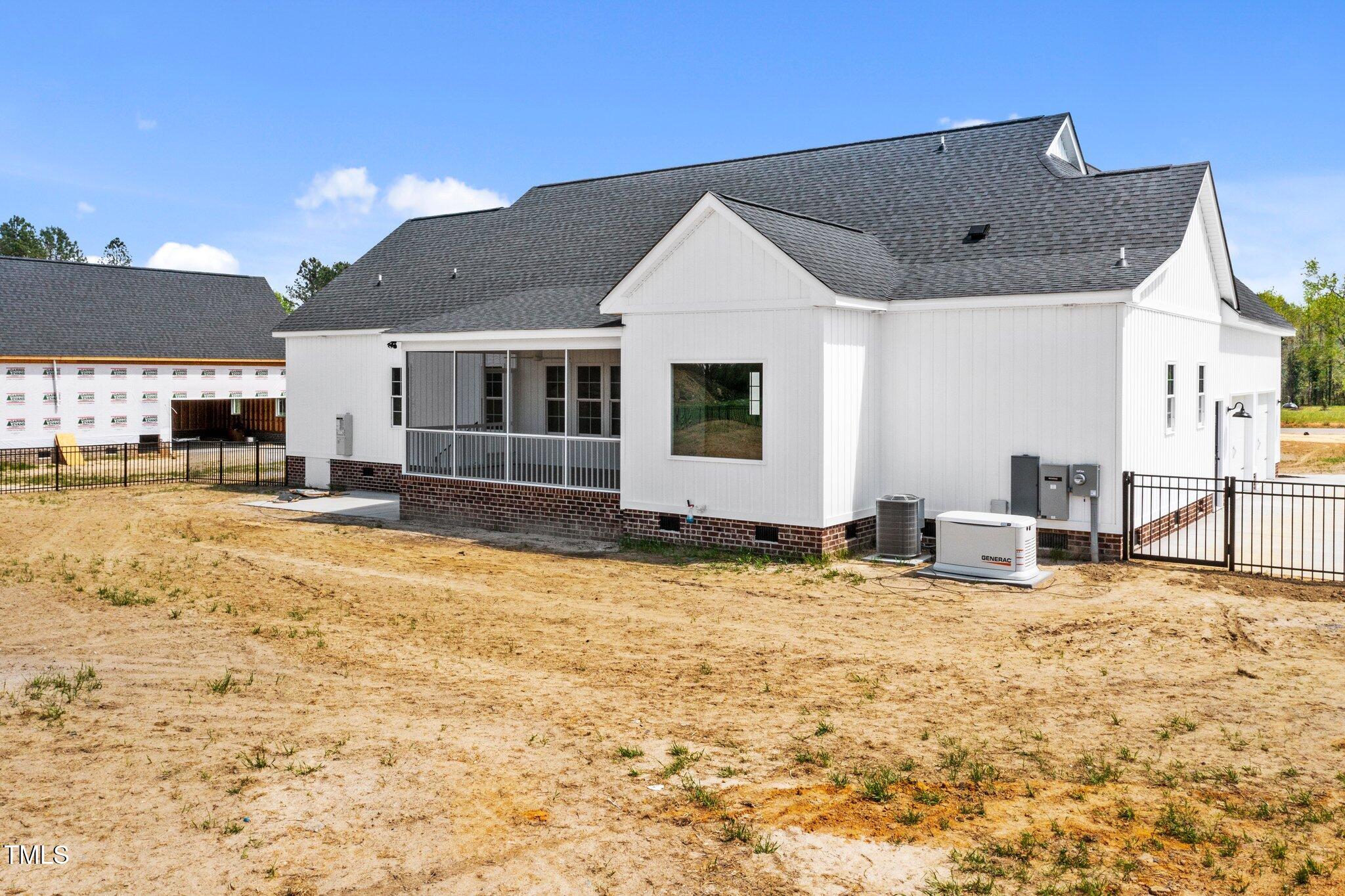 2379 Heartland Road Battleboro, NC 27809 - Photo 38 of 44 a view of a house with a swimming pool