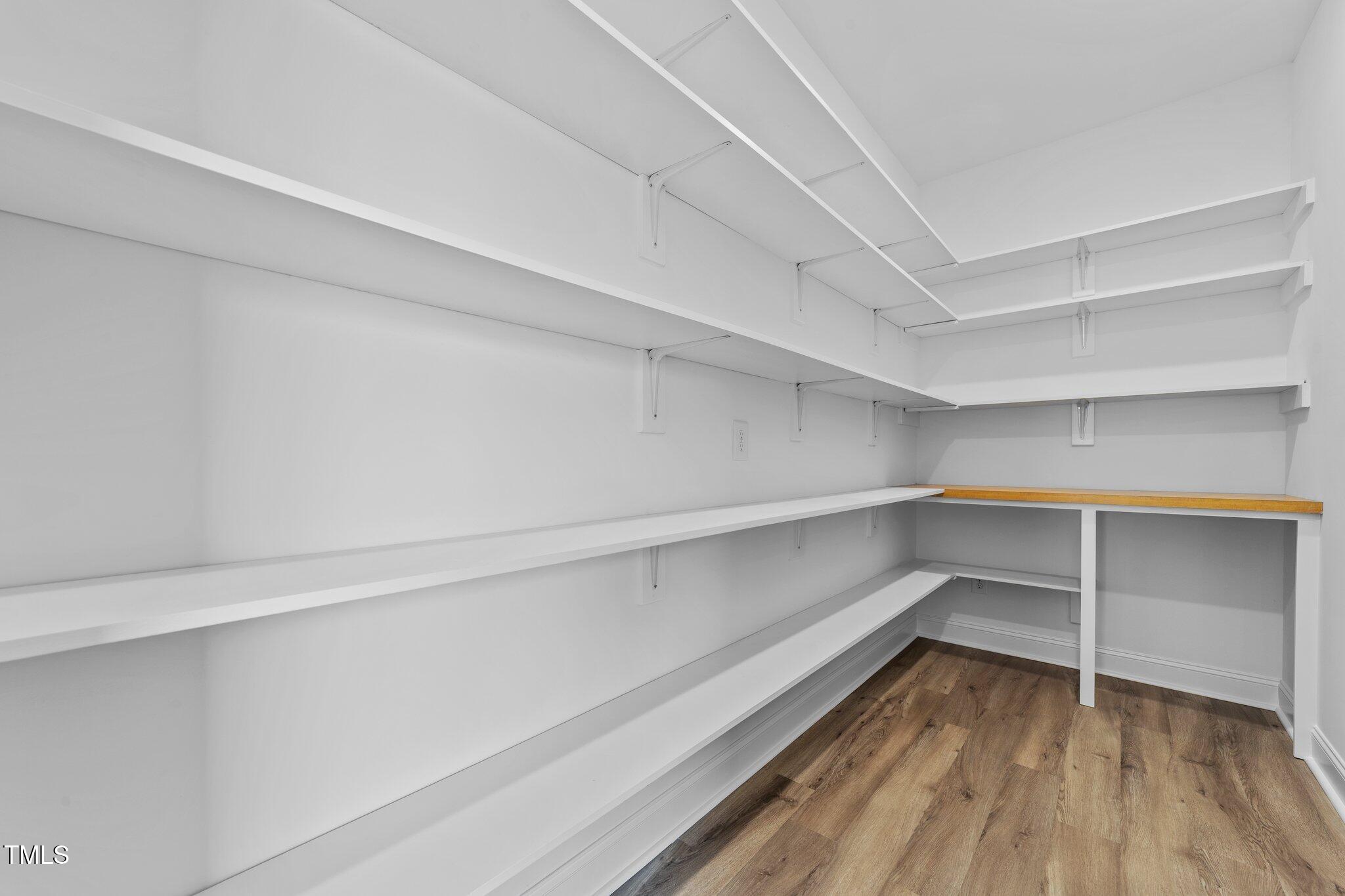 2379 Heartland Road Battleboro, NC 27809 - Photo 10 of 44 a storage room with wooden floor