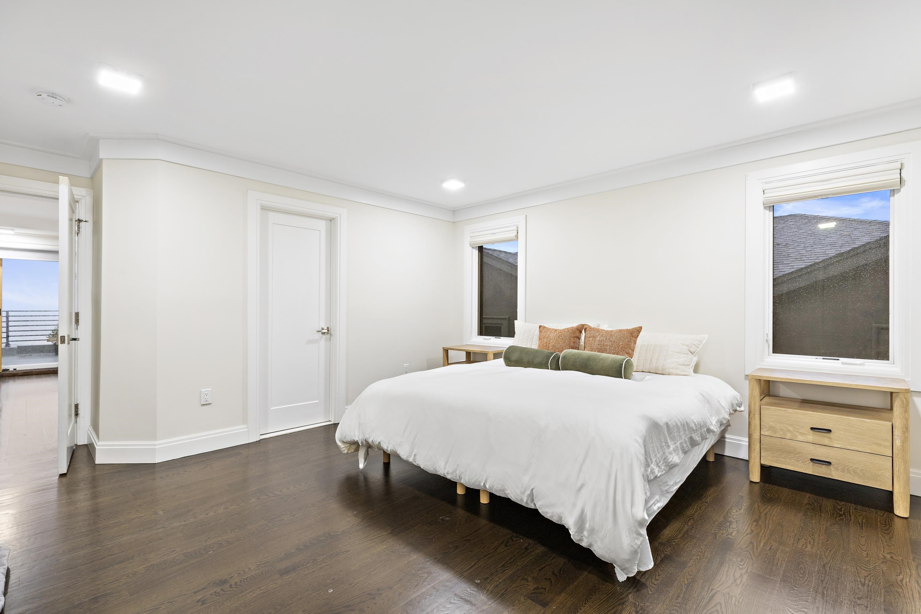 640 Undercliff Avenue Edgewater, NJ 07020 - Photo 17 of 26 a bedroom with a bed and a view of bedroom