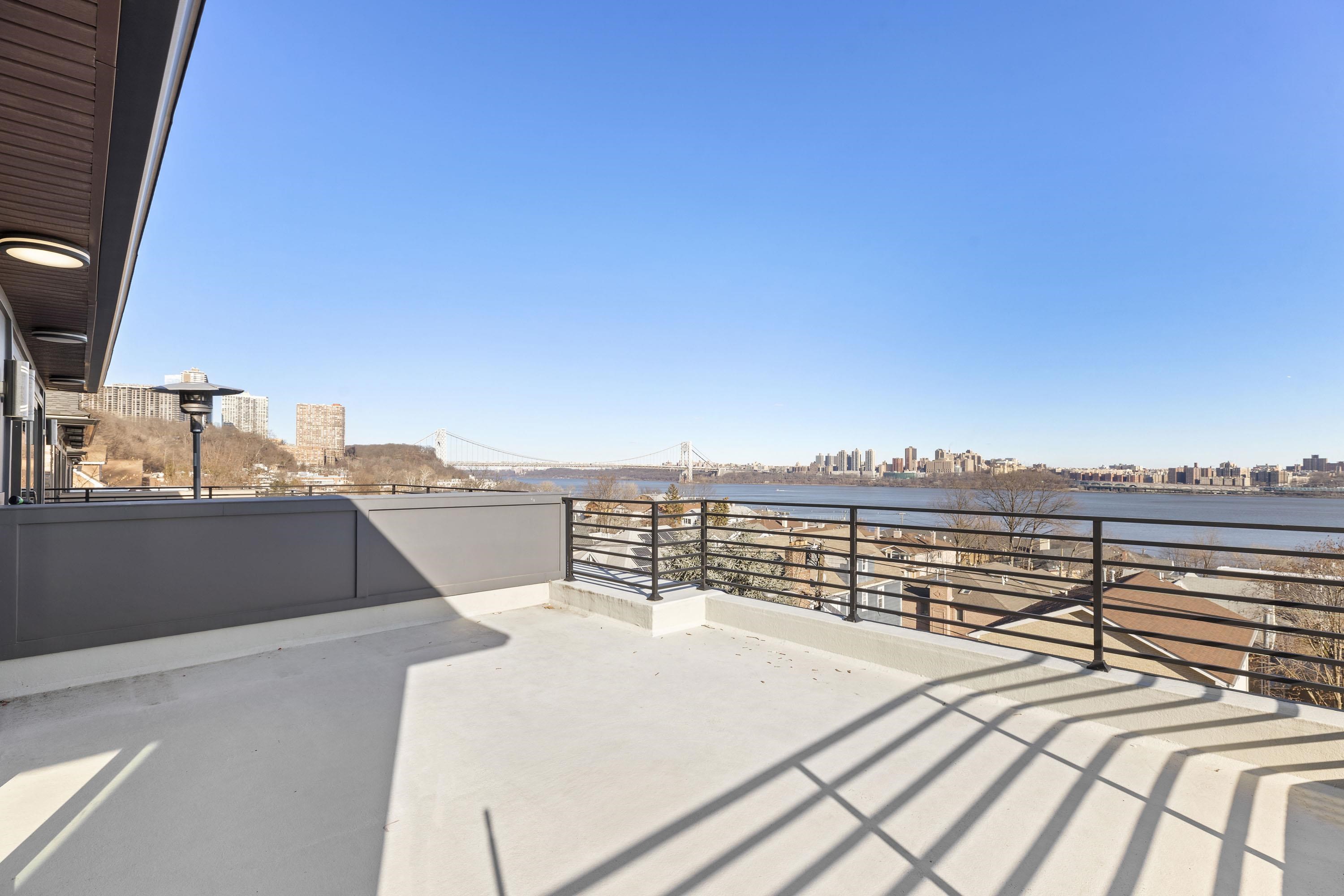 640 Undercliff Avenue Edgewater, NJ 07020 - Photo 24 of 26 a view of a balcony with an ocean view