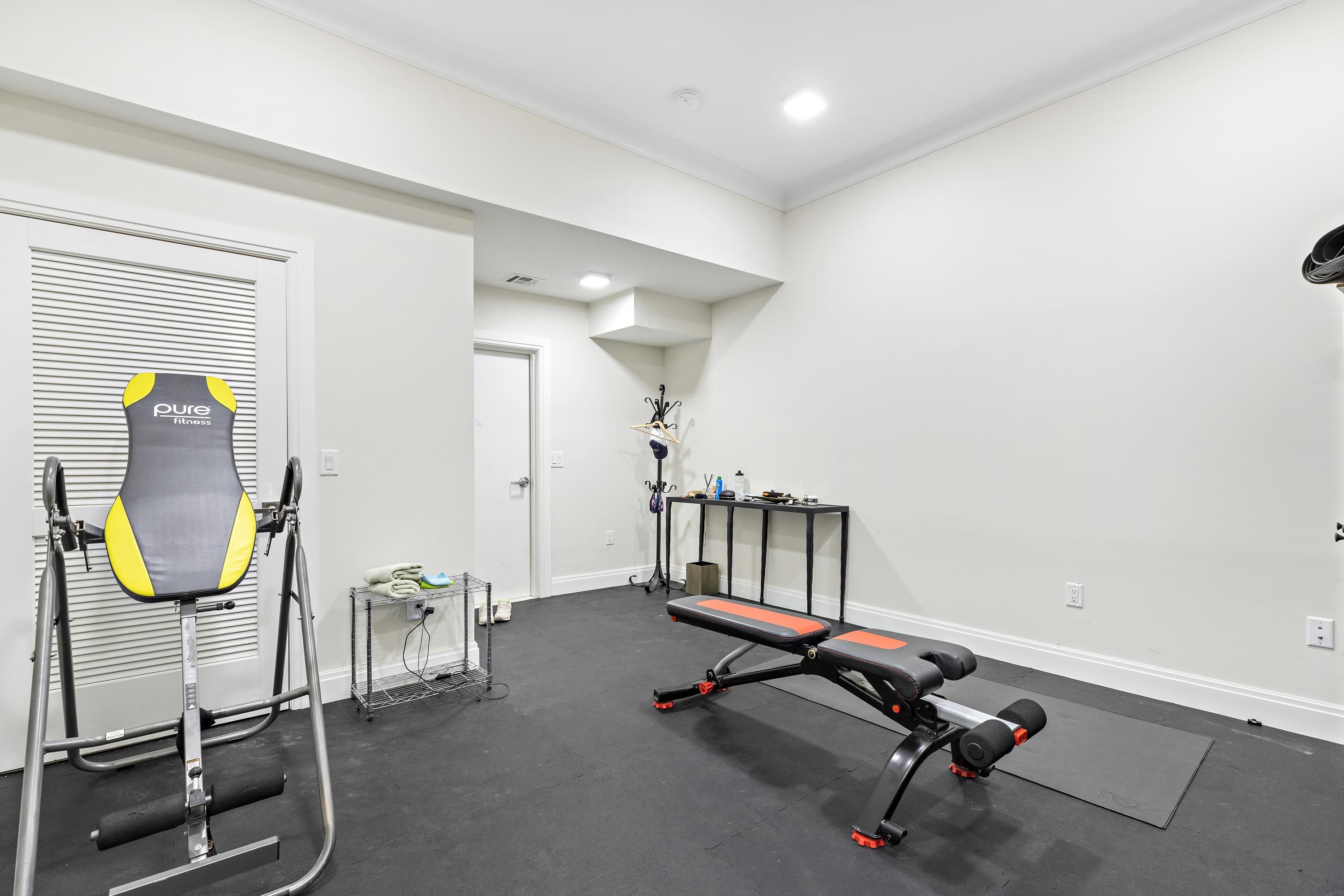 640 Undercliff Avenue Edgewater, NJ 07020 - Photo 25 of 26 a view of a room with gym equipment