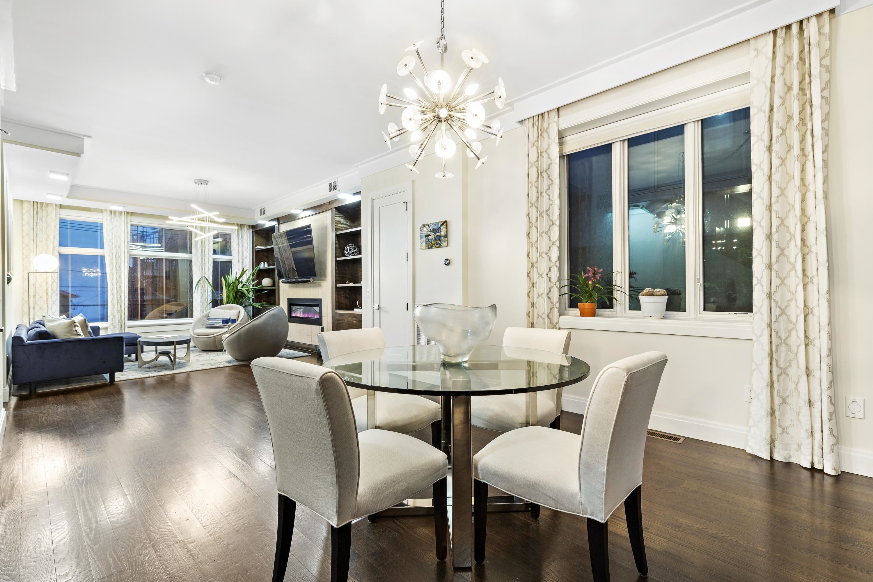 640 Undercliff Avenue Edgewater, NJ 07020 - Photo 5 of 26 a view of a dining room with furniture window and wooden floor