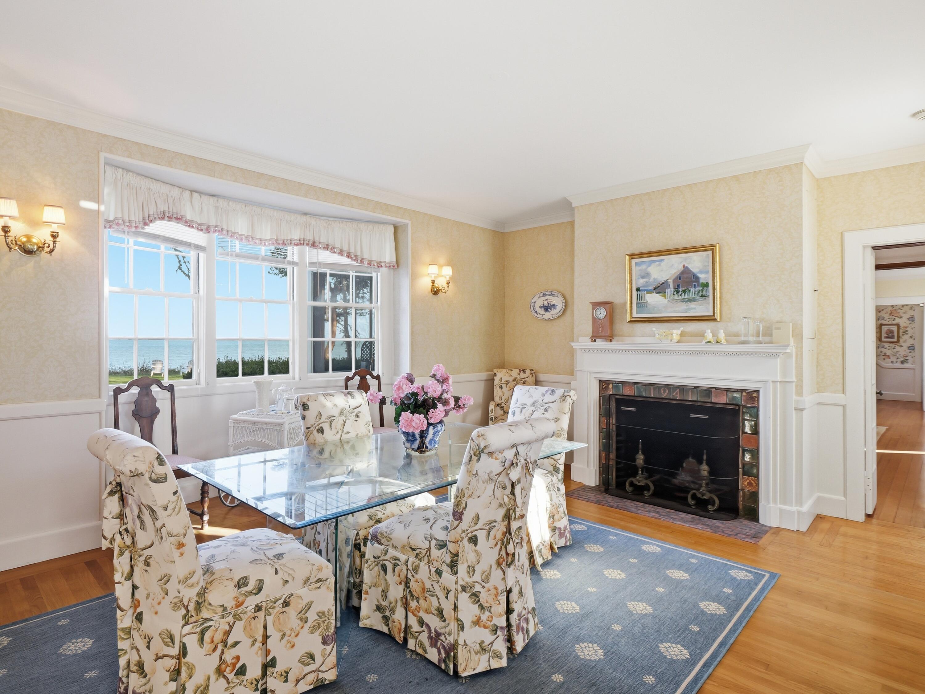 190 Vineyard Road Cotuit, MA 02635 - Photo 17 of 41 a living room with furniture fireplace and wooden floor
