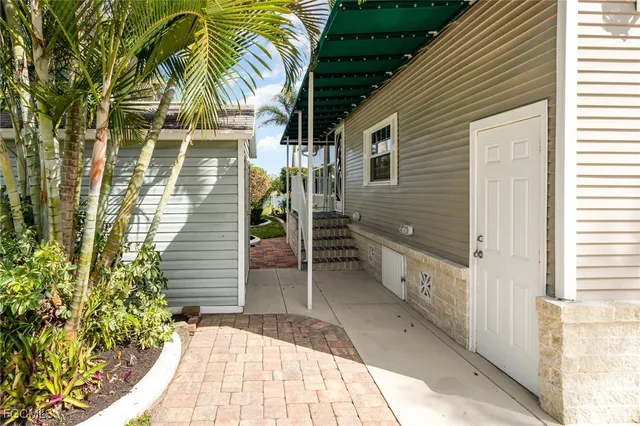 a view of a balcony with chairs