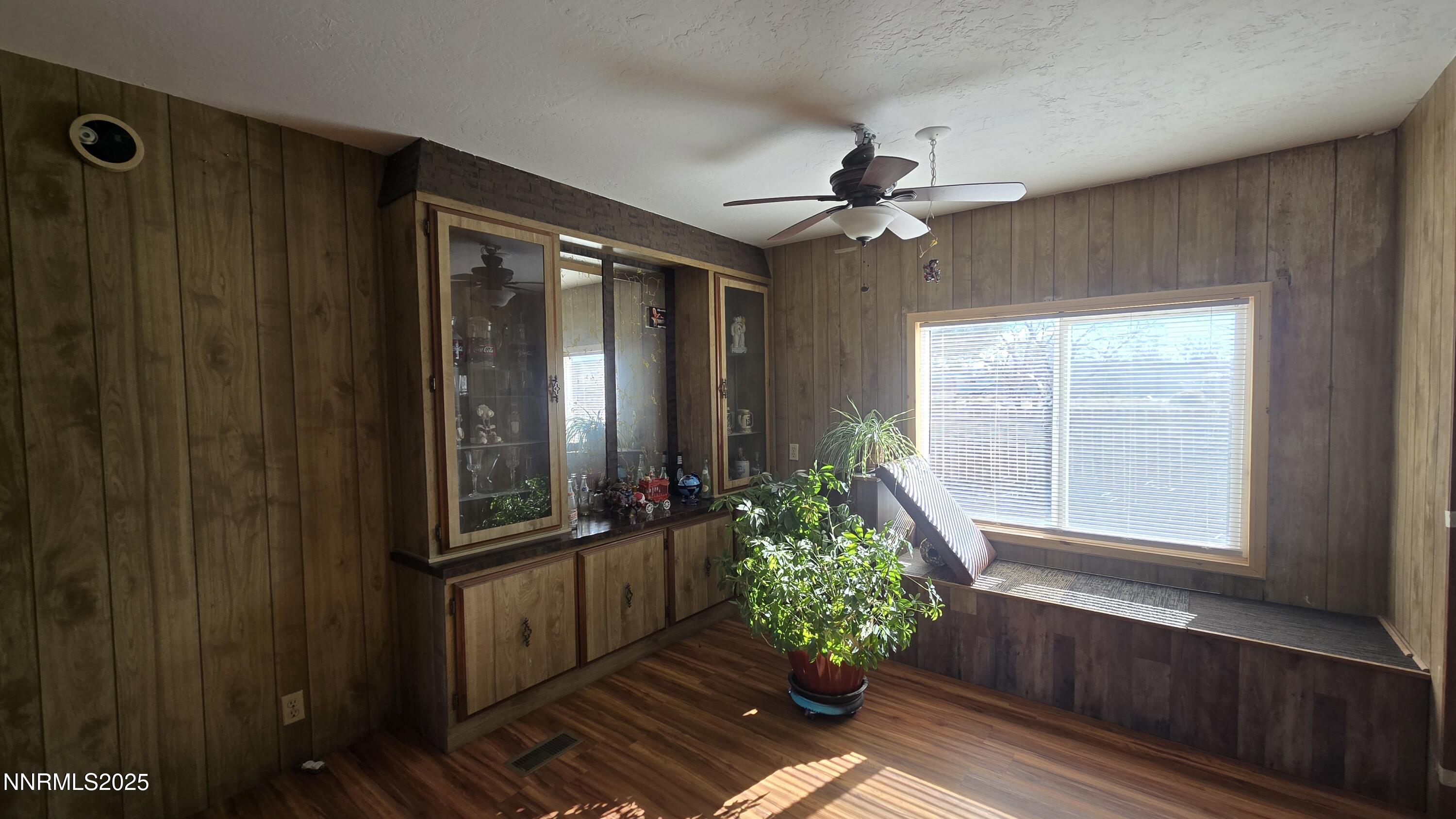 3801 Citrus Street Silver Springs, NV 89429 - Photo 5 of 27 wooden floor with a potted plant in a room
